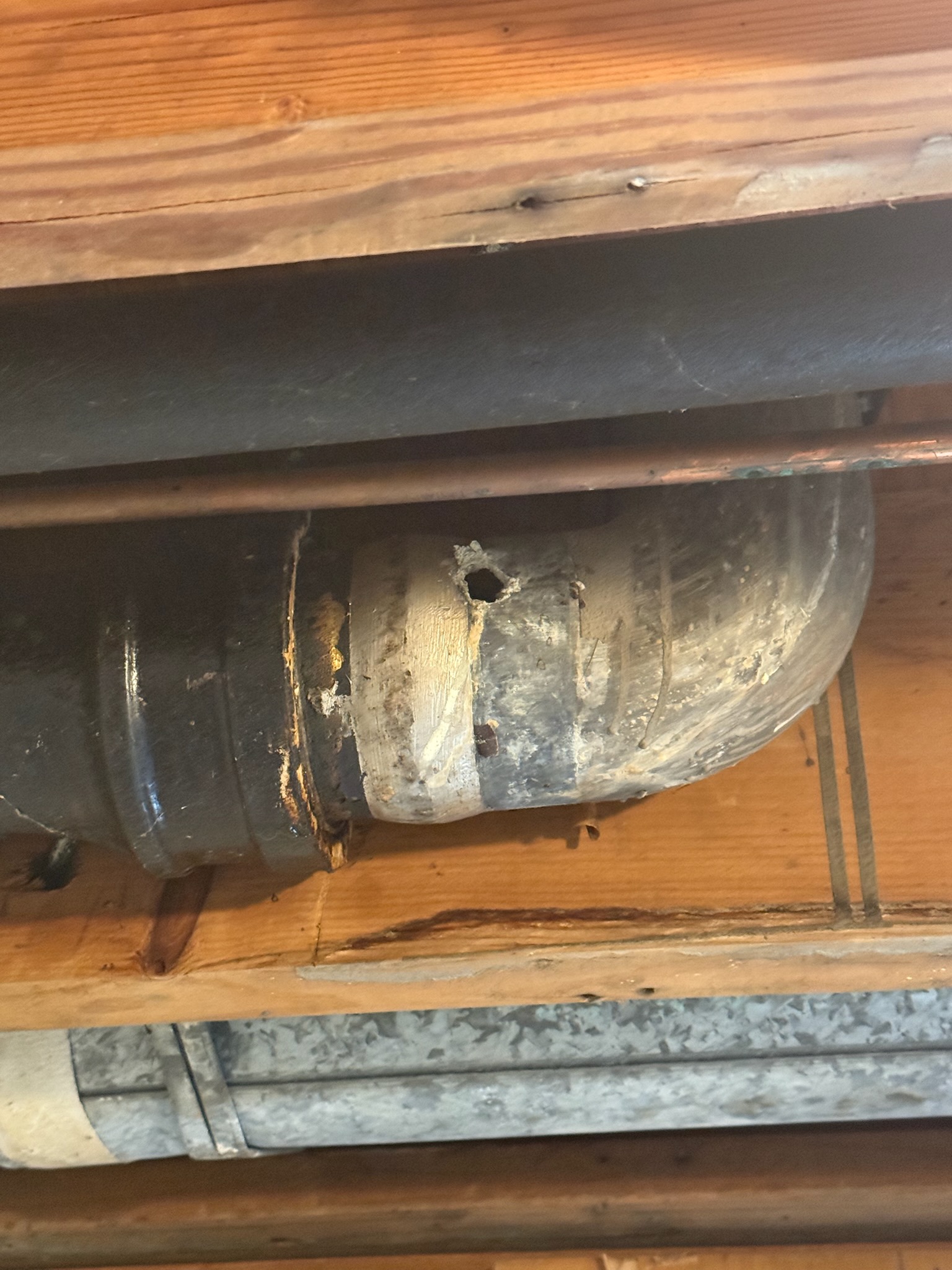 Customer had Reliable out for water damage in the ceiling. Once drywall was removed customer was made aware of a hole on the lead pipe going to toilet. Customer also had questions about slow draining tub. Left quote for flange replacement, and told customer tub looked incorrectly piped, but couldn’t get a full view. Can accurately quote necessary repairs to the tub once the tile is removed and the subfloor is removed in the bathroom. 