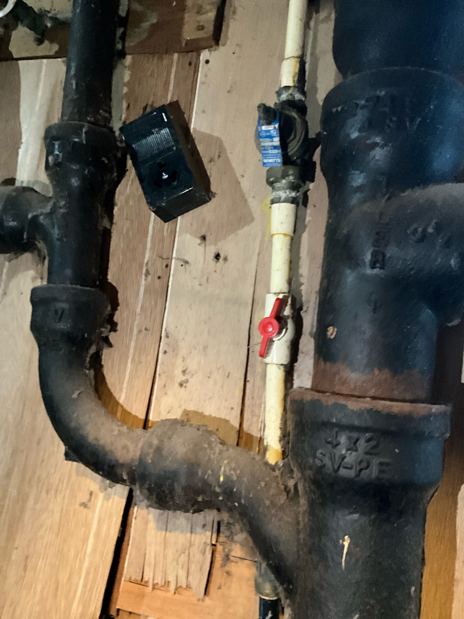 Call for leak inside home.

Assessed on site and found that there is a leak on the main line near the foundation. Pressure regulating valve is old as well, and I recommend replacing it.

Due to age of home, evidence of prior improper repairs (sharkbite inside, some covered in tar and touching foundation), I recommend replacing waterline from meter to home, as this would remove any unknown risks of prior breaks and repairs, and allow us to replace the pressure regulating valve and shut off valve.