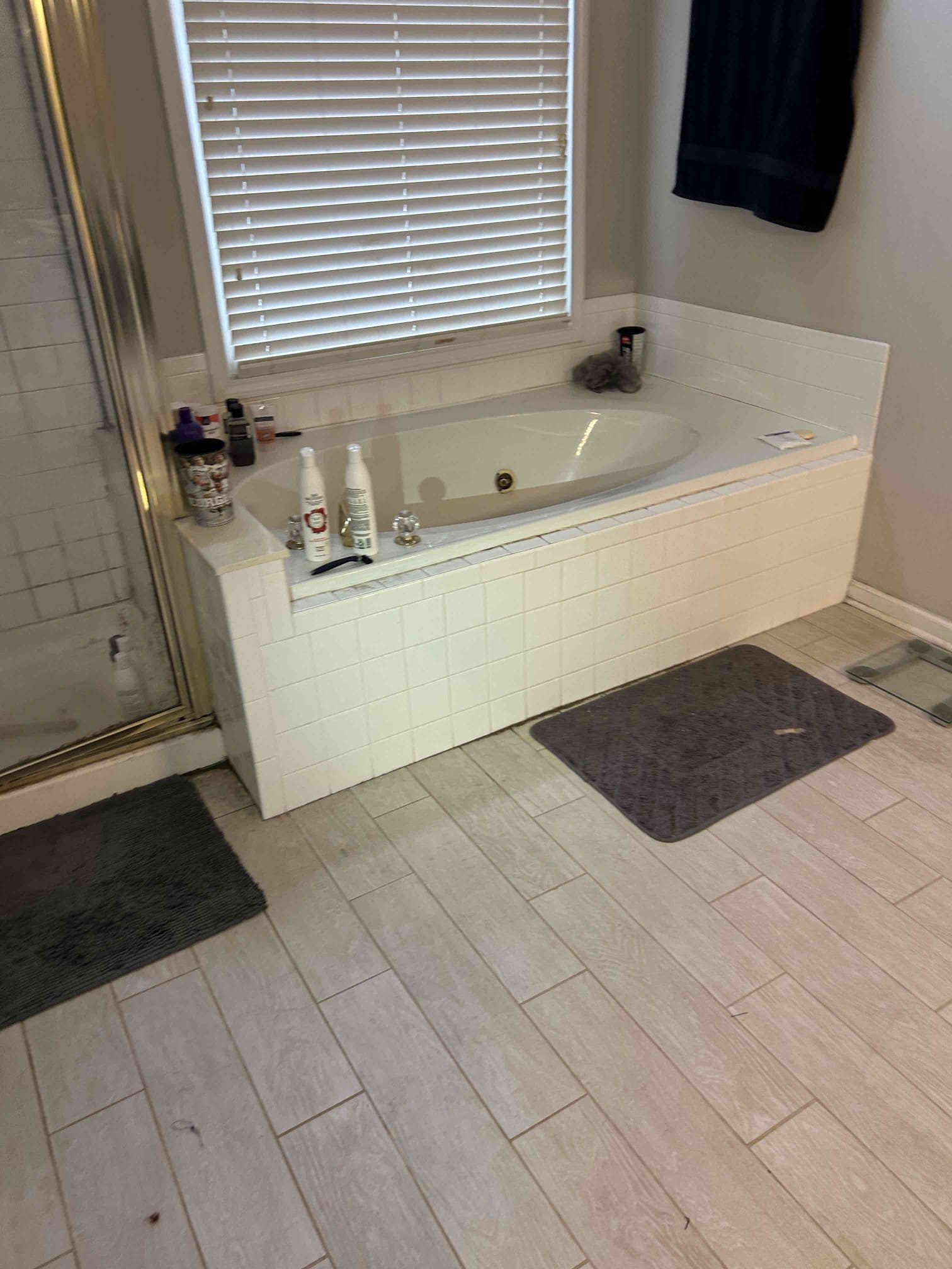 For this customer they have a wet spot on the ceiling of the garage, the customer had an access panel for their whirlpool tub in the master bathroom where the toilet is at. The spot in the ceiling needs to be cleaned and sanitized, I looked for this concealed leak by opening up the access panel to discover the leak, I filled up the tub about 6 in below the waste and overflow, in addition to that I waited to see if I saw anything in the mean time. While I was waiting the leak was coming out of the one of the jet ports and it is a very small leak however it was leaking down in to the garage below. At this time there is no work to be done due to that fact that we do not work on jetted tubs and or regular bathtubs. The water pressure is at 50 psi, the water heater is located in the basement, the dog was in the basement and so therefore I didn’t take a look at it. At this time no work will be performed. 