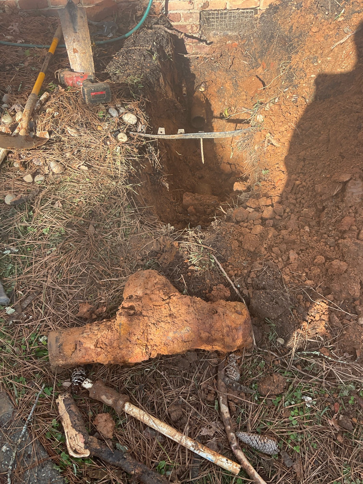 Dig up outside , installed two way clean out , snake and camera the main line , fixed some bad pitched 4” ABS pipe in crawl space , fixed broken pipe installed new toilet flange and installed customer supplied toilet 