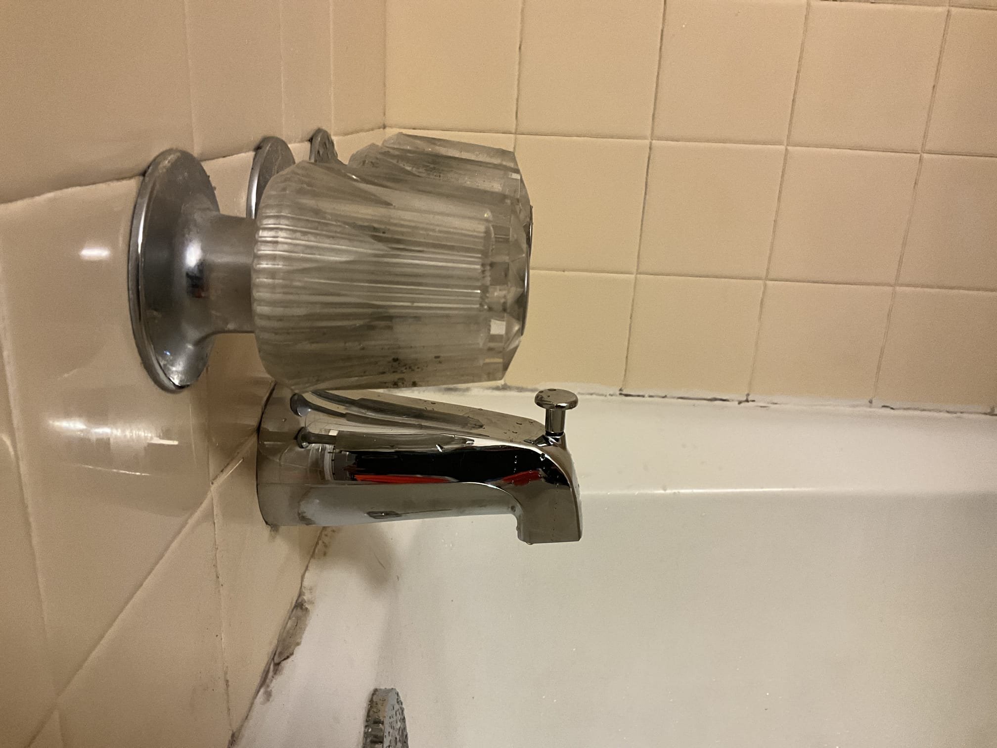 Customer had a three handle shower valve hat wasn’t diverting completely from the tub to the shower. Informed customer that due to the age and condition repair isn’t recommended as you risk causing additional leaks on the valve, or needing to potentially replace all together. Customer stated that while permanent solutions are eventually the goal, the shower just needs to be functional for the holidays first. Recommended installing a tub spout with a diverter to divert the water so that the valve doesn’t risk being touched and needing to be repaired or replaced additionally. The customer consented to this service. Replaced the tub spout and tightened two packing nuts to temporarily stop handle leaks. If there are any additional issues with the valve replacement is recommended. 