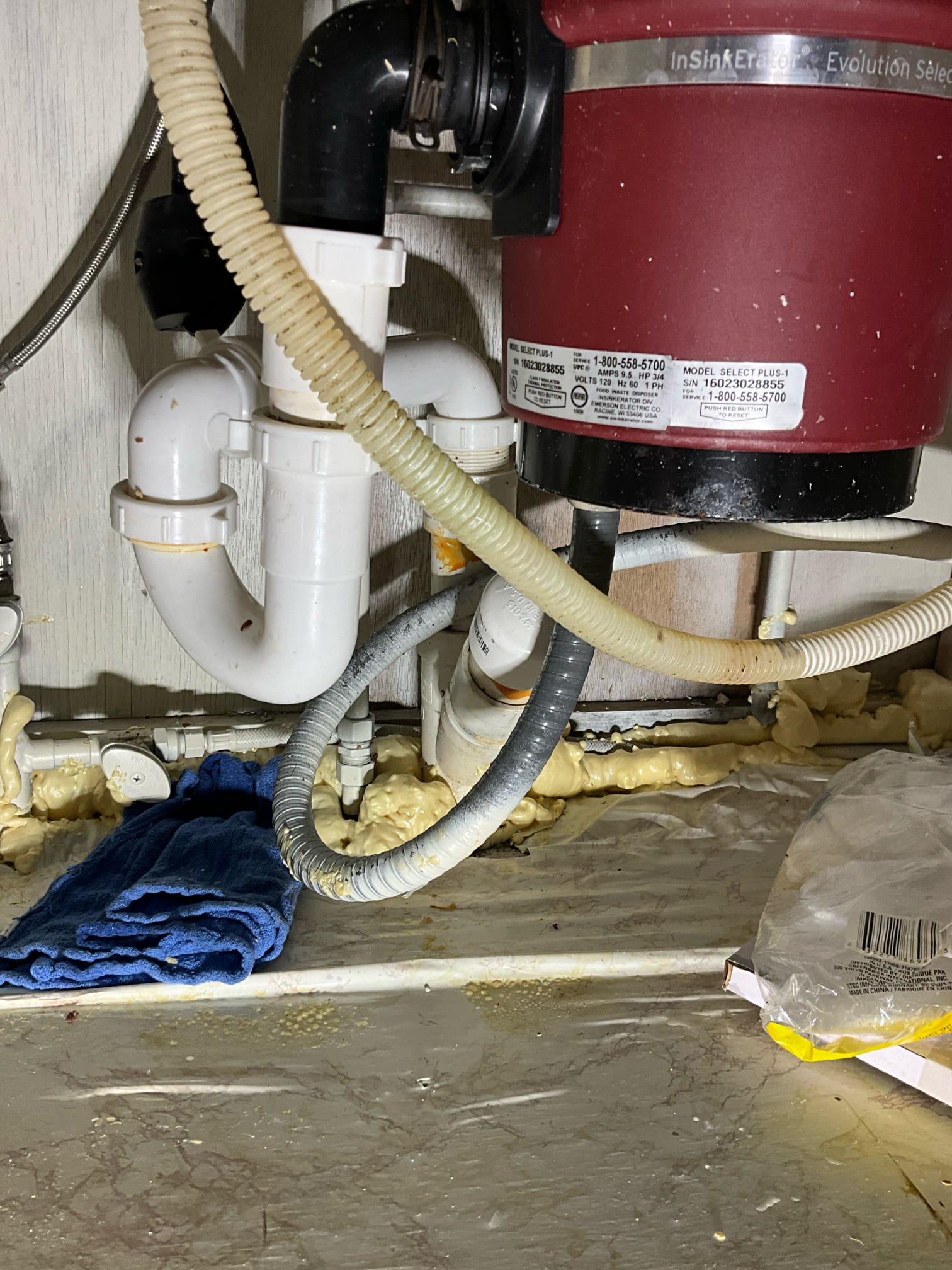 Call for garbage disposal.

Arrived and discovered disposal had a blockage in the p traps. Ms. Rochelle also mentioned water leaking under the sink. When I checked for water leaks I found that the kitchen faucet sprayer line has a leak. Also discovered incorrect trap components, and a missing gasket. Also incorrect p trap setup. 

I recommend replacing disposal, faucet, and rebuilding the drains.

After speaking with home owner on phone, he has requested three quotes, and each have been provided.