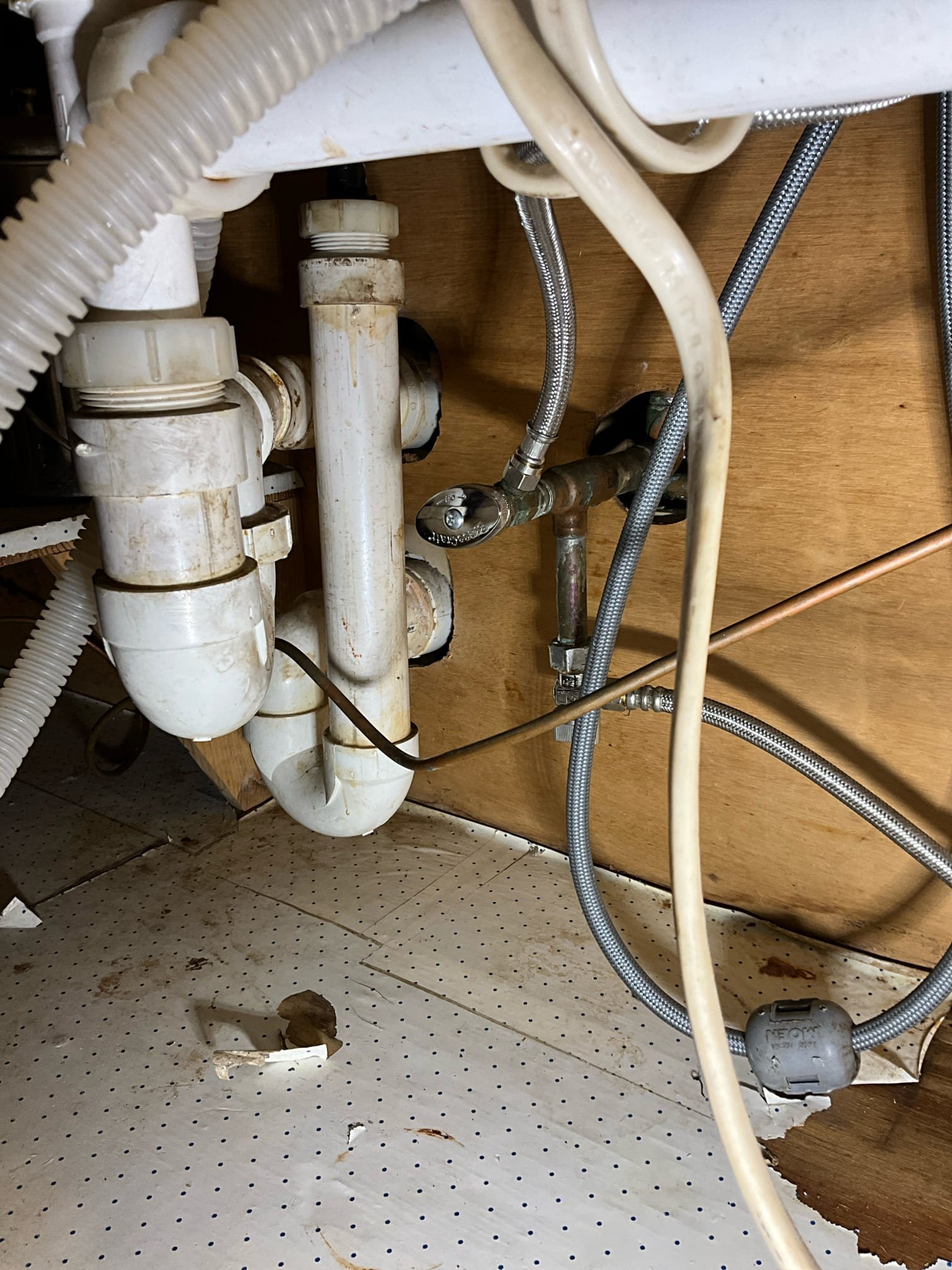 Call for issues under kitchen sink and to install filter and faucet.

Discussed concerns and work with Ms. Adelle. She would like a new filter faucet installed and has already drilled the hole in her sink. The dishwasher wasn’t draining. Some of the shut offs don’t work, and one was leaking.

Today, we installed the provided faucet and filter in the kitchen. We also replaced the shut off valve for the dishwasher, the hot side for the faucet, cold side for the fridge ice maker, and repiped section to accommodate the new filter. I changed the dishwasher drain to the disposal. Replaced the supply lines for the washing machine.