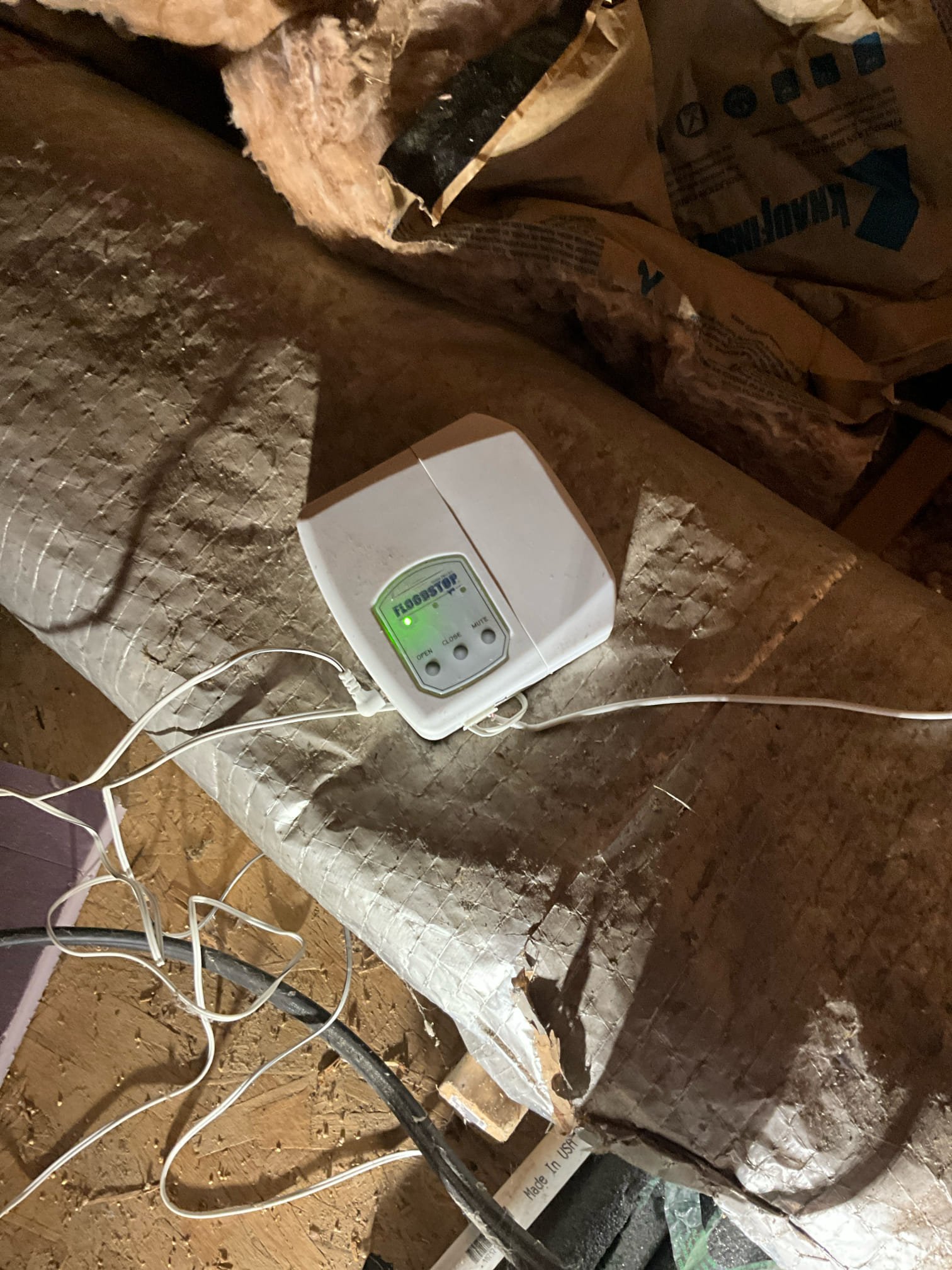 Call for steam shower issue.

Arrived and met with Austin and Ms. Josephine. Austin states that the steam unit in the master shower has power, but won’t produce steam. It has been installed for many years, potentially 7-10 years. It has worked fine until the last few months. 

Inspection revealed the following:
Steam control unit in shower does have power. Steam unit is located in the attic above master bathroom. Flood stop automatic shut off was showing that it has activated, and the valve was closed. Rust marks and signs of water escape present on the side of the unit and the drain pan. T&p line empties straight in to pan above flood stop sensor. I turned valve open, and Austin stated steam unit still not functioning. To ensure we assess the entire system, I went to check water pressure at the water heater. Water heater located behind master bathroom on second floor (there is another water heater in the home). As soon as we found the water heater I discovered the install has signific