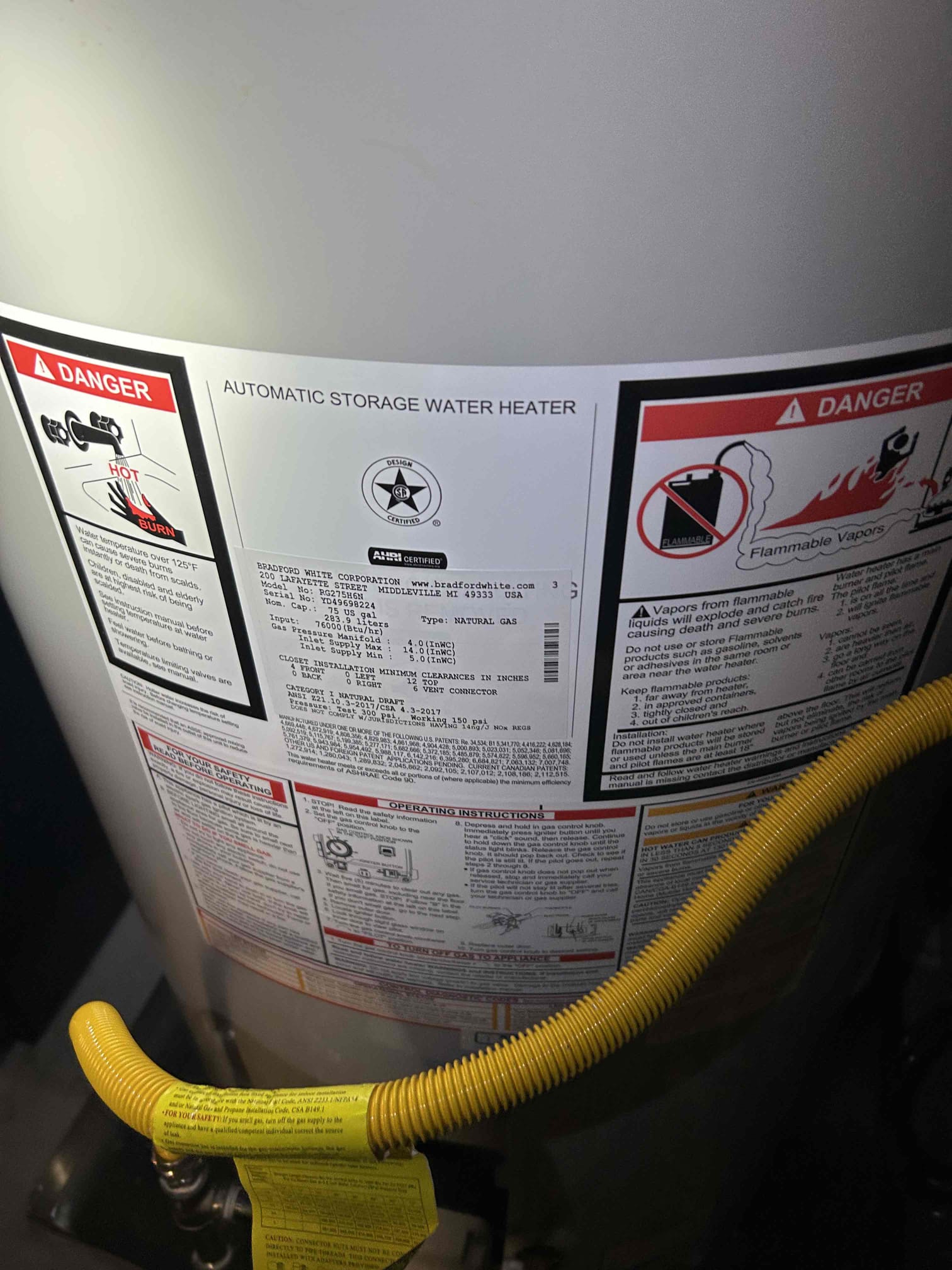 For this customer, the gas to his grill outside wasn’t getting any gas to the grill so I looked around to find where the shut off valve is or if there’s a problem with the gas line did not smell gas so that is good but more importantly could not find the gas shut off valve located the gas shut off valve underneath the range cabinet And it was turned off there however he had a weird configuration with his gas piping so therefore I recommended to clean it up and push the gas line with the quick connect backwards so his kids don’t start playing with the gas line and potentially cause an issue so that is what I recommended and that is what we did install the new 90 with the 2 inch nipple fall by the gas shut off valve and then a close nipple to connect the quick connect into it once that was complete. I tested the gas piping work that I did with bubble solution and there’s no gas leaks water pressure is at 45 psi And the customer has a fairly new Bradford white water heater 75 gallon with 