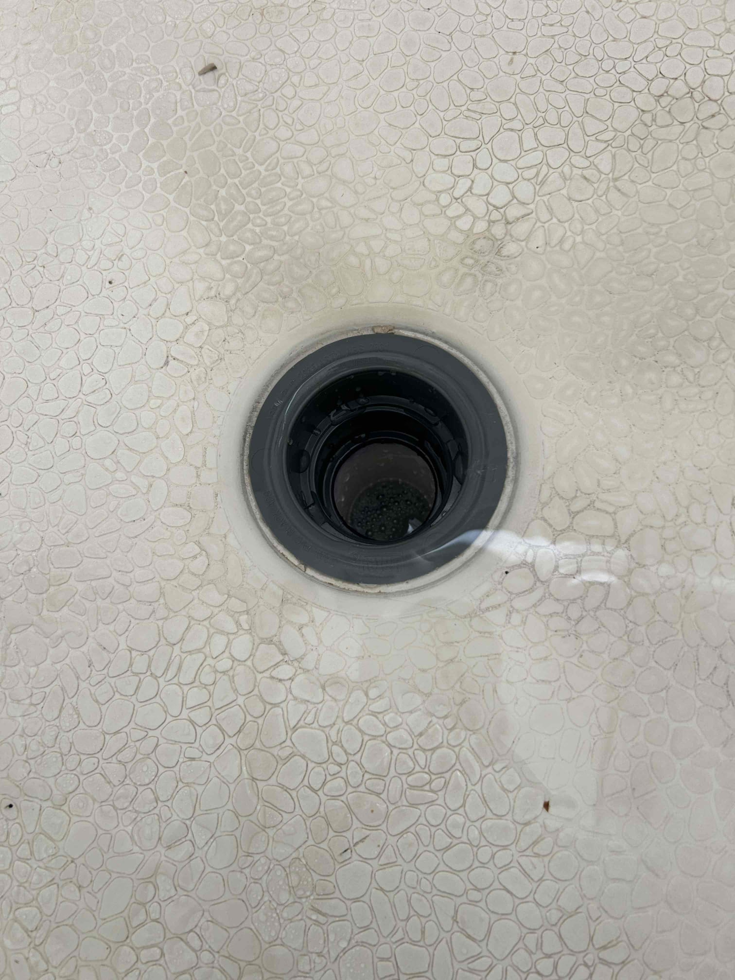 For this job, there was another leak when I first came out I located the leak for the tub that was leaking down below and as a result of that, I recommended to get a contractor with those tubs to get it fixed or have our water restoration partner take it out and potentially get fixed as well. However, that was not the only leak the shower floor drain was also leaking so therefore what I recommended is to cut the old pee trap out the old pipe and essentially reroute the PVC P-trap and install a brand new one once that was installed with the new shower drain, there are no leaks, primed and glued all fittings used a Fernco for one of the joints Once installed the job is complete no leaks 