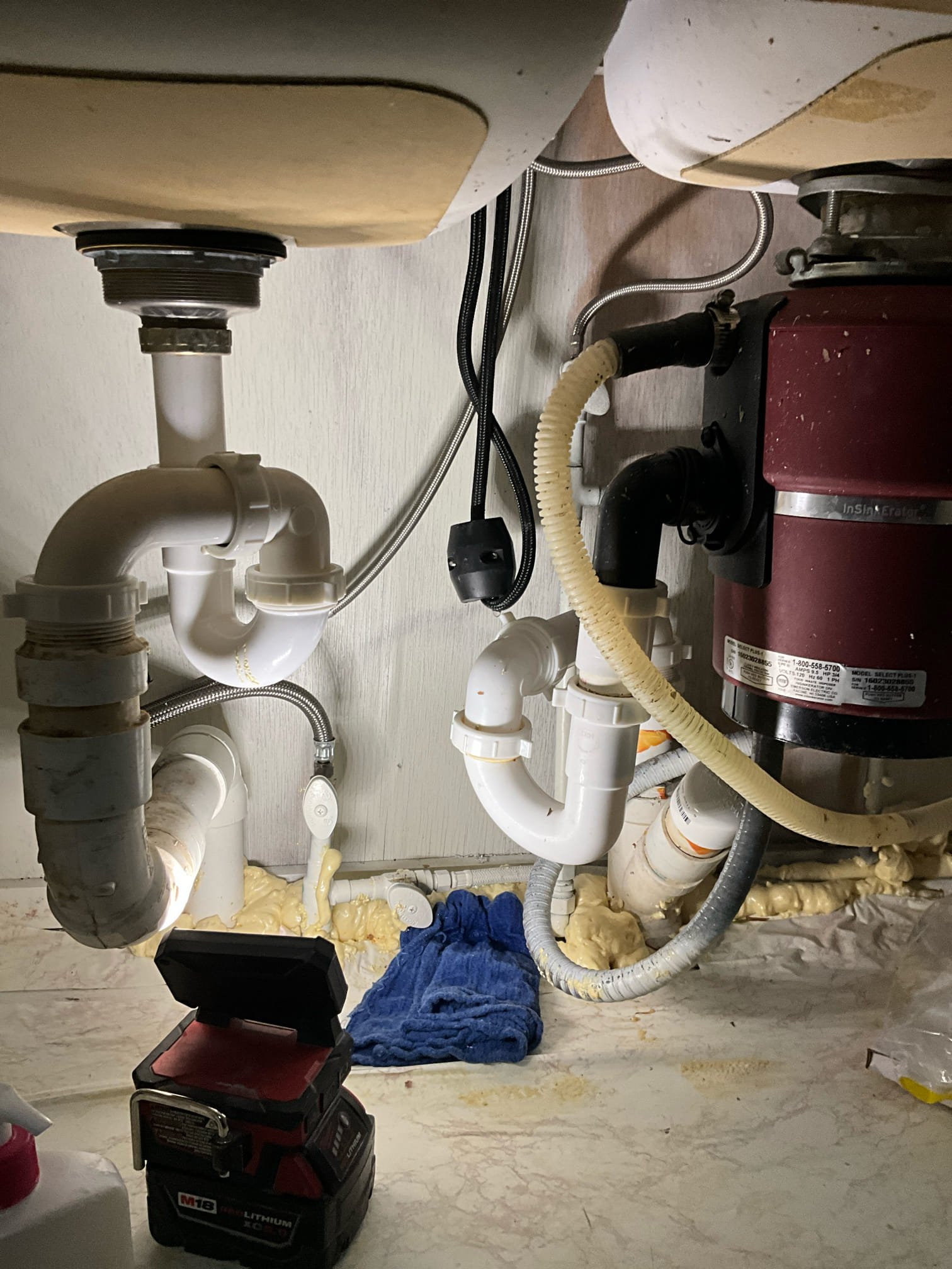 Return to install customer supplied kitchen faucet.

Removed faucet and installed Kohler faucet. Also added gasket to p trap drain tube off disposal.

When testing pressure I discovered that the water heater is 3-5 years pst its life expectancy, and has not been flushed. Black water released when checking pressure. I strongly encourage to replace the unit as soon as possible.