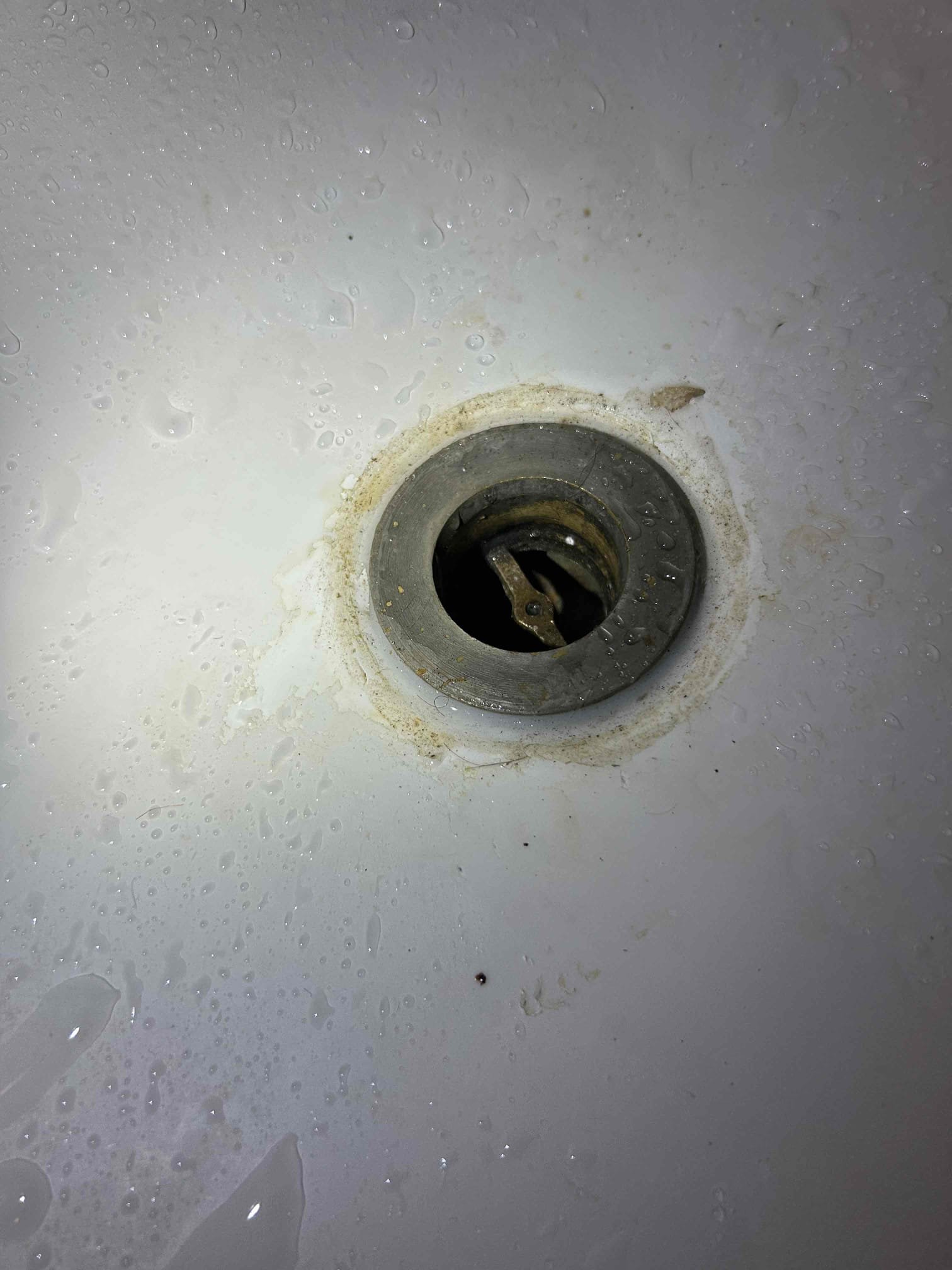 For this customer they have reliable hvac, plumbing and electrical came out to snake the tub drain. However the problem is the the other tech took off the drain to run a hand snake on the tub. And he didn’t take off the overflow plate. When he was done he went back with caulking rather than silicone or plumbers putty. What I recommended for the repair is we replace the overflow cover plate and the drain with new plumbers putty. The customer is wanting to see if the other company will warranty the work as it is their fault that water is leaking below to the other unit. At this time no repairs will be made. Wasn’t able to check water pressure. No hose Bibb or individual shut off valves. Water heater is from 2011 recommend to replace 