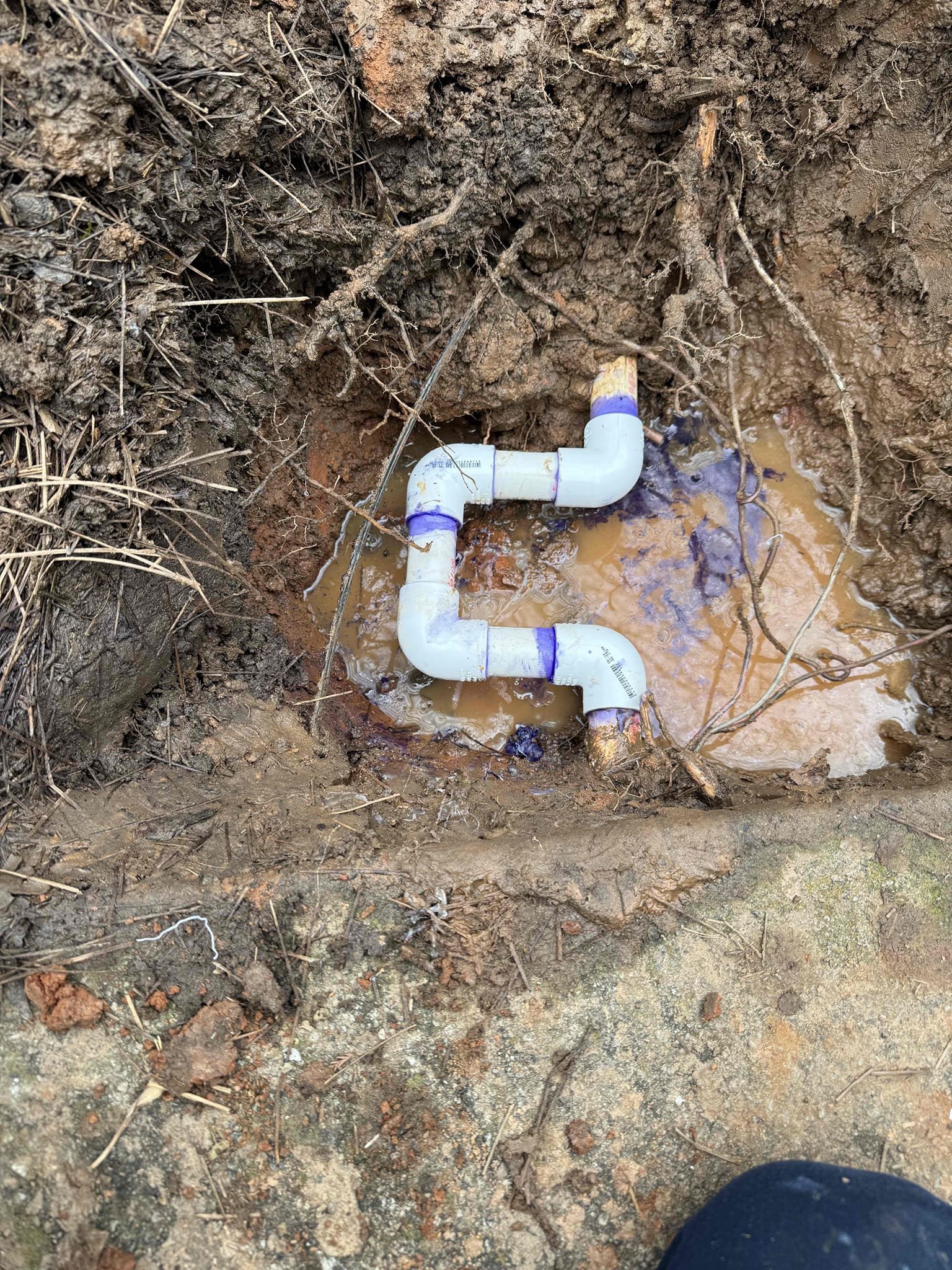 Water leak in yard upon arrival. Customer stated he noticed water running from towards the meter down the driveway. Informed customer we could dig up the water line to find the leak. Dug up line and found 1 inch pvc leaking at a coupling due to not being glued fully in the coupling. Informed customer we would cut that section out and replace it. Gave customer estimate. Customer approved estimate. Cut out old section of pvc and added new section. Turned water back on to check our spot repair for a leak and did not find one. Informed customer his meter was still spinning but we had no way to isolate the water just to the front yard due to a gate valve being seized. Informed customer we could replace the gate valve. Customer stated he was going to wait and handle that later. No leaks from our spot repair upon departure 