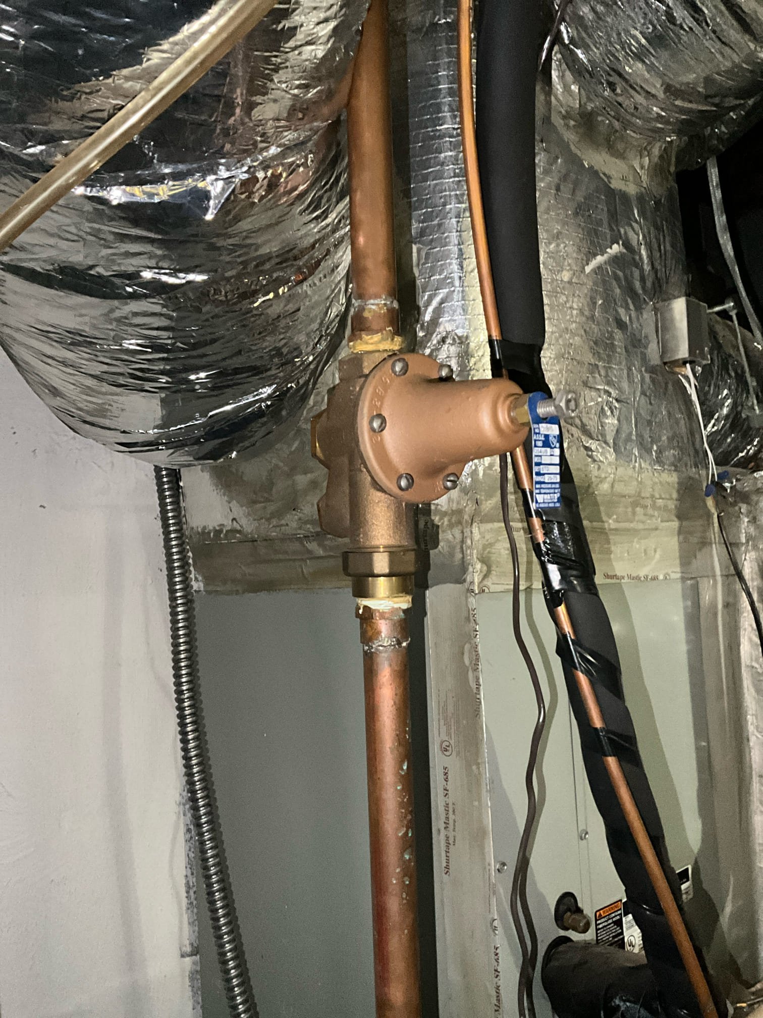 Customer had a leak on 1/2 copper hot line in garage ceiling. Cut and repaired the leak on the line for search for concealed leak price. Checked house pressure just over 80 psi and installed a new 1 inch prv. Customer also needed tankless serviced. Flushed the unit. Noticed on startup it coded an error 12 message which is failure to ignite. Noted this to customer. It’s only did it initially and doesn’t pose immediate concern, but if any additional issue happen diagnostics may be necessary to repair or replace components on the gas or ignition system. Replaced leaking widespread faucet upstairs. 