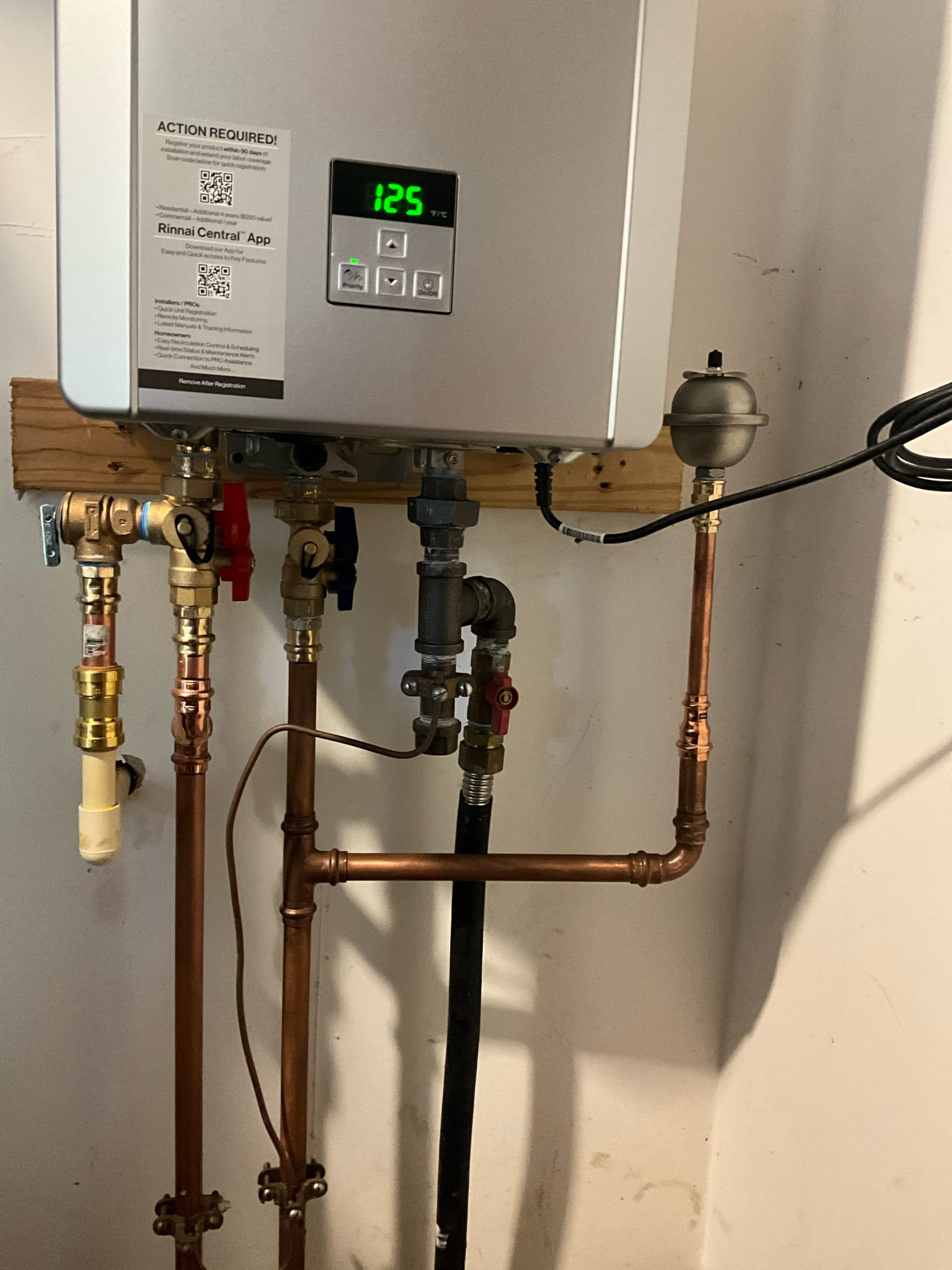Returned and install a new Rinnai RE199in in utility room in customer garage. Connected to existing gas, vent, and water. Set parameters to the correct setting and set temp to 125. Tested all work to ensure proper functioning and no leaks. None were found. 