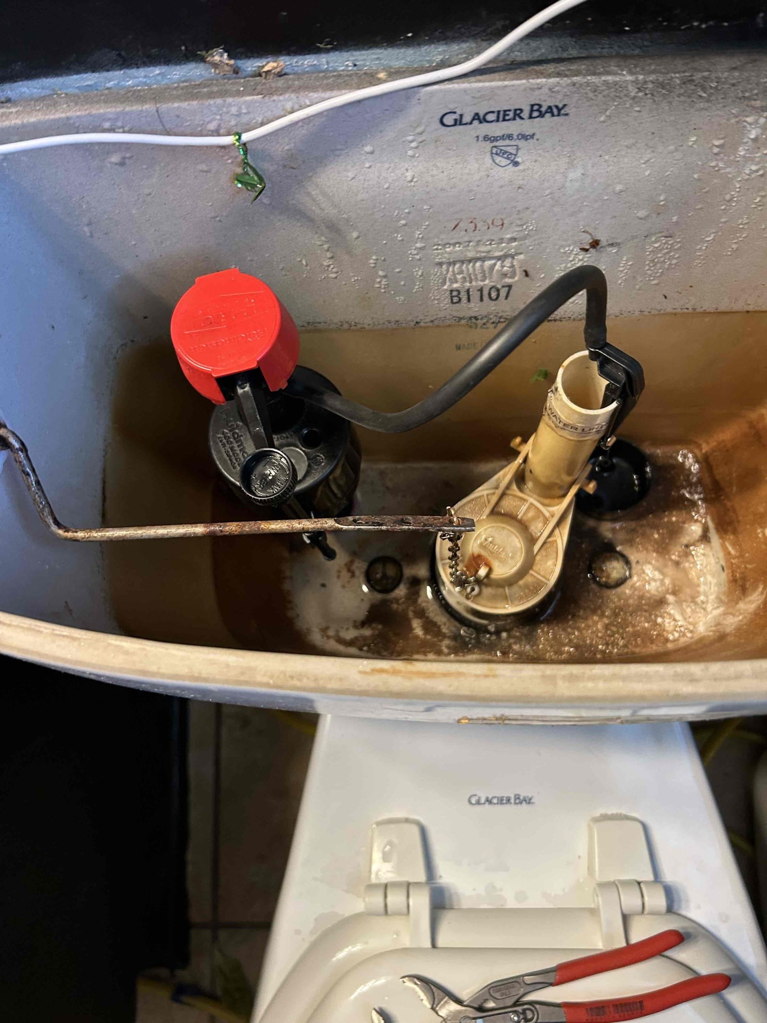 For this customer, they had a supply line burst on the toilet in the guest hallway. Bathroom is a ranch style home so as soon as the toilet supply line kicked on, it flooded the entire house for majority of it. I’m not sure the extent of the damage due to the fact that I was not the first one here I just went ahead and replaced the supply line on the toilet but not only did I replace the supply line. I had to replace the fill valve due to the fact that the fill valve had cracked when the supply line was on it once I replaced the pressure reducing valve. There are no further leaks inside the house got the pressure down to 60 pounds rather than 110 the water heater I would make a correction to it either replace it or bring it up to code. The water heater is from 2016 so it is coming to end of life soon but the way that the thermal expansion tank is mounted. It is mounted via a Sharkbite T on pecks piping I recommend to re-pipe it in copper due to the fact that it may fail at some point i