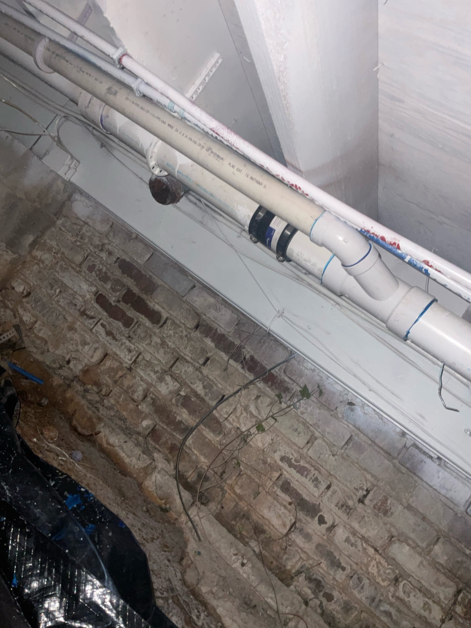 Plumbing installed for washing machine at garage , hot and cold water line with shut off valves , drain connection and AAV installed 