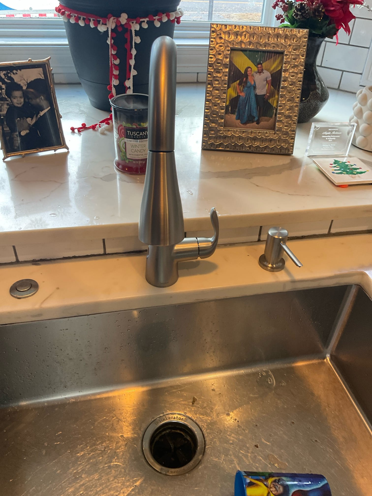 Replaced kitchen faucet with customer supplied 