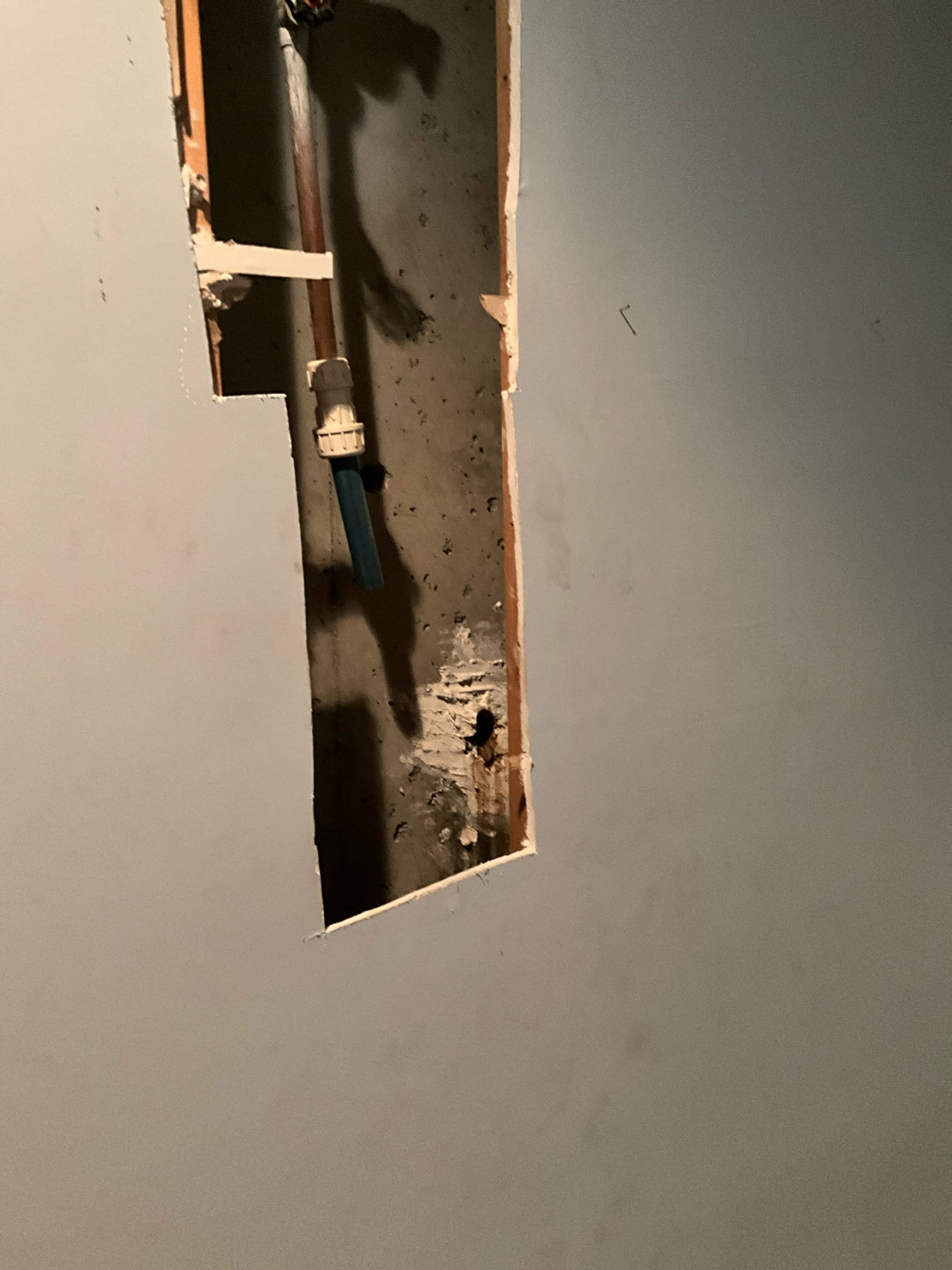 Call for water main leak near house.

Arrived and spoke with Mr. Keith. We were out several days ago to repair a break on the irrigation line. Today there is a leak from near the house. 

I dug down approximately 4-5 feet and found a nearly totally severed blue poly line. Main line is 1 inch blue poly, which is a known defective pipe material. However, I believe this rupture has occurred due to the entry angle and tension on the main line. I cut out bad section, drilled new hole in foundation at correct angle. New waterline was sleeved and water proof concrete applied to new penetration and old waterline penetration. New main shut off installed and lowered to be more accessible. Pressure regulating valve was nearly 30 years old. Although pressure read fine during last visit, I believe this was. False read due to ruptured waterline. We replaced prv to protect home from further issues. 

When backfilling hole, I mentioned that much of the clay has been washed away, and Mr. Keith states t