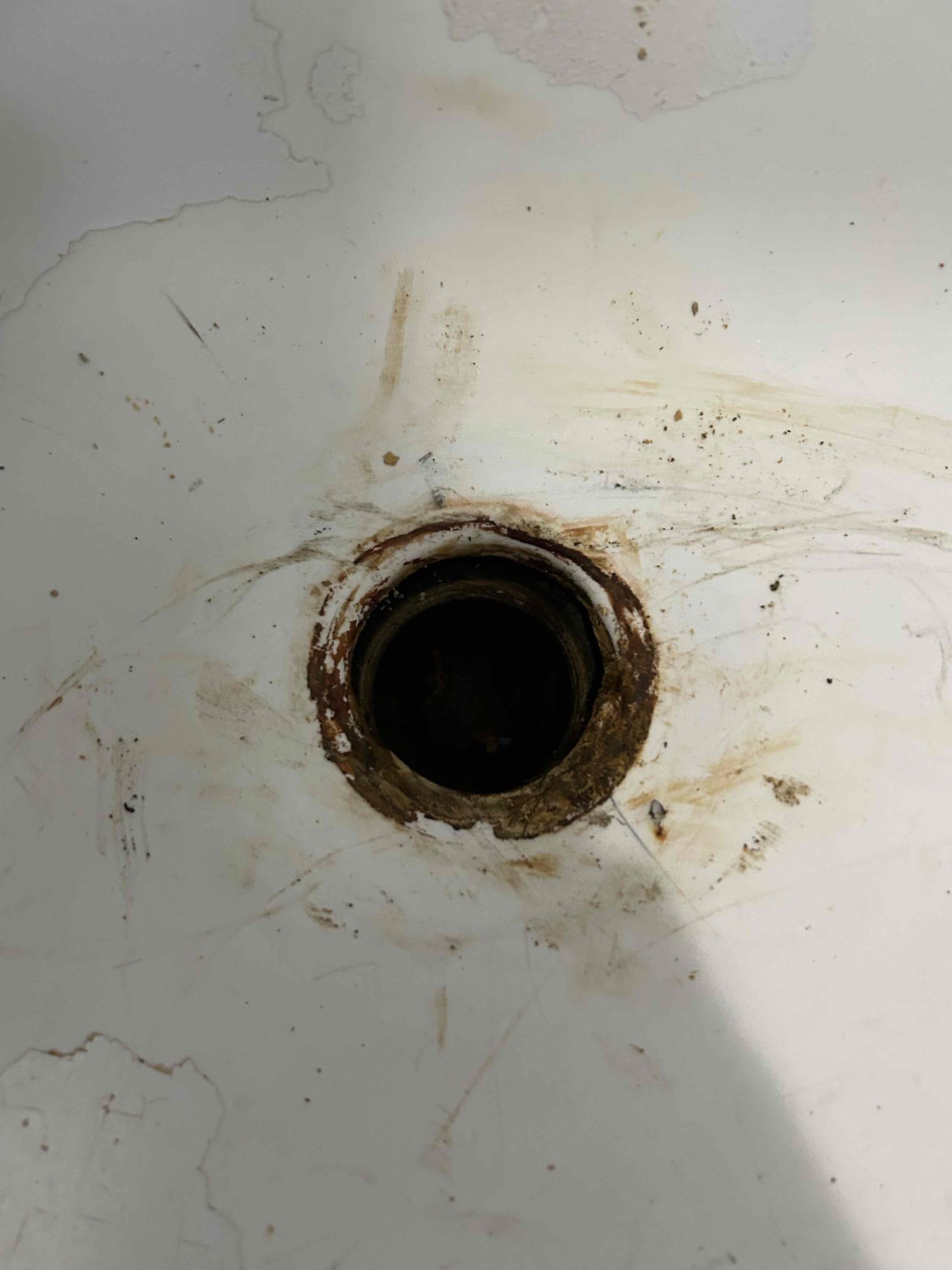 For this customer, they called us out for a rotten out, wore out tub drain in the guest hallway bathroom, their tub is a cast-iron tub and the old plastic tub drain needed to be replaced due to all the corrosion. I tried to take it off with my inside the pipe nipple extractor however I was unsuccessful at doing that so therefore had to chip away with it with a screwdriver and take it out piece by piece, once I was complete I cleaned out all the debris from the drain line, including old pieces. I shot backed it all out to ensure that there would be no debris lodged in the sewer line, so it would prevent a back up, clean the surface as best as possible following that I re-put the new tub, drain or brass conversion went back with the brush, nickel look cleaned up everything and there’s no further leaks at this time and or issues. The water pressure on the house is at 65 pounds. Perfect pressure. Water heater is from 2019 in good condition. 