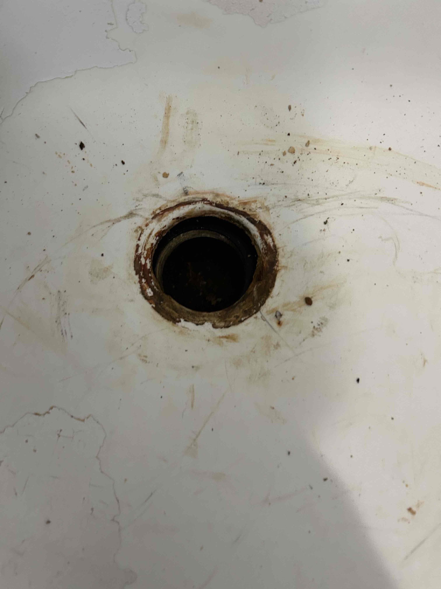 For this customer, they called us out for a rotten out, wore out tub drain in the guest hallway bathroom, their tub is a cast-iron tub and the old plastic tub drain needed to be replaced due to all the corrosion. I tried to take it off with my inside the pipe nipple extractor however I was unsuccessful at doing that so therefore had to chip away with it with a screwdriver and take it out piece by piece, once I was complete I cleaned out all the debris from the drain line, including old pieces. I shot backed it all out to ensure that there would be no debris lodged in the sewer line, so it would prevent a back up, clean the surface as best as possible following that I re-put the new tub, drain or brass conversion went back with the brush, nickel look cleaned up everything and there’s no further leaks at this time and or issues. The water pressure on the house is at 65 pounds. Perfect pressure. Water heater is from 2019 in good condition. 