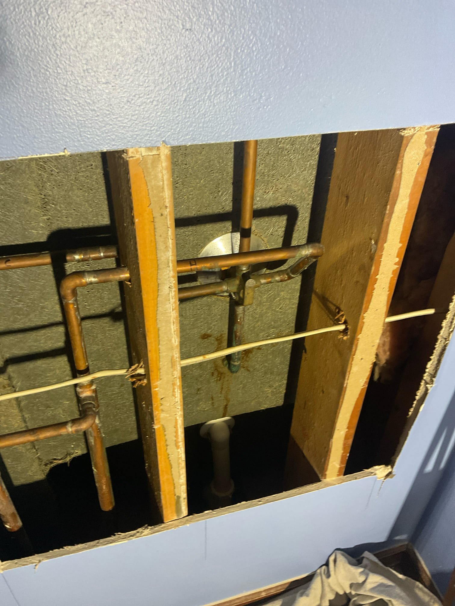 Replaced a single handle tub / shower with customer supplied delta faucet from access opened by customer in behind 