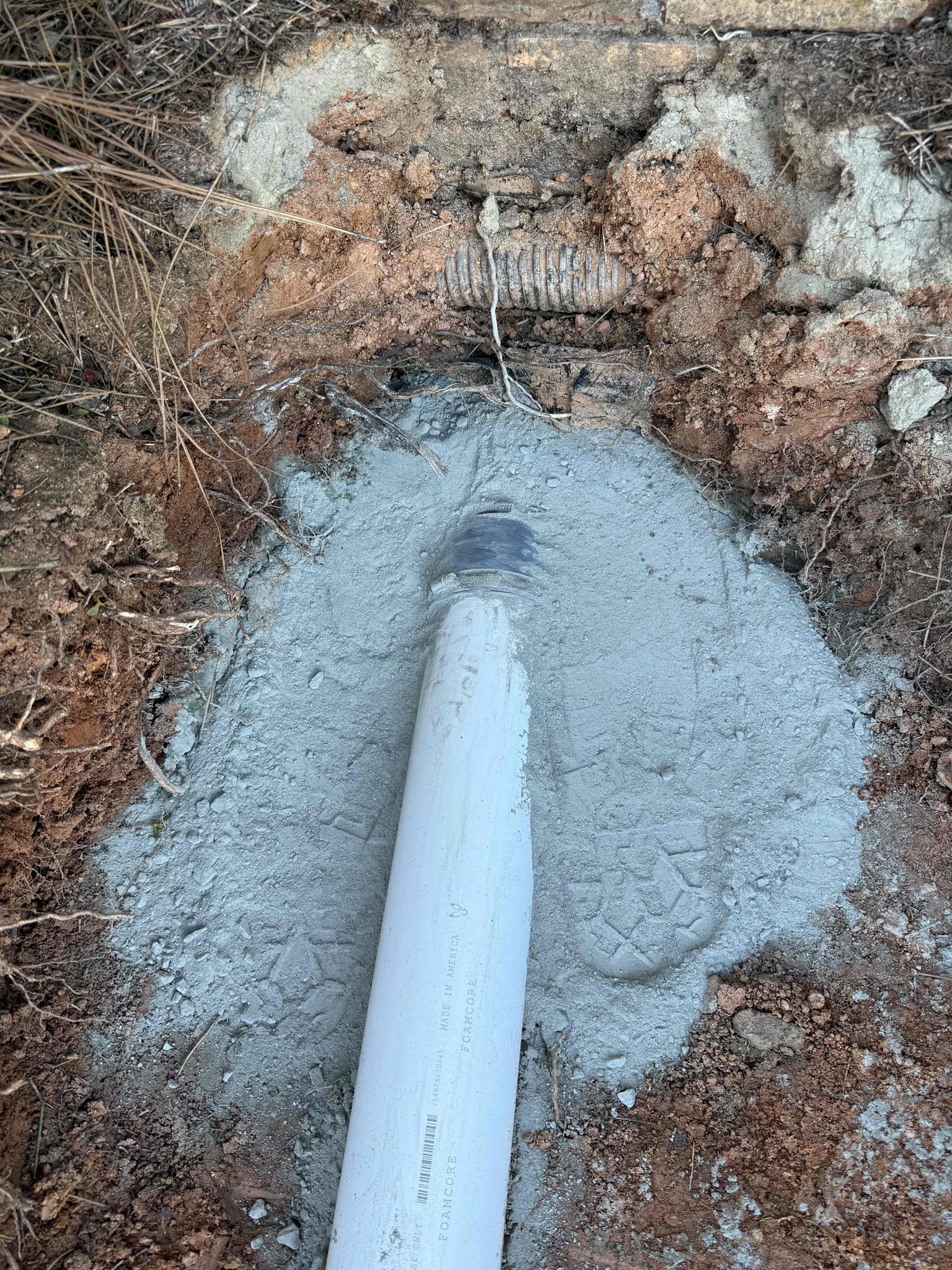 Partial Sewer Main Outdoor Installation - Less than 65 feet in developed length AND less than 8 feet at deepest point: Installation of an exterior sewer line up to 70 feet in developed length, with trench depth not exceeding 8 feet. Scope includes excavation, pipe installation with proper slope, suitable bedding, backfilling, and connection to the existing sewer or municipal system. Cleanouts are included as needed for access. Work is performed with a focus on proper function, structural integrity, and long-term performance of the system.

Warranty: Includes a 5-year parts and labor warranty covering the complete sewer main installation.

Warranty Disclaimer: Warranty excludes damage or blockages caused by improper use, including flushing “flushable” wipes, feminine products, paper towels, grease, or other foreign objects, as well as excessive use of chemical drain cleaners. Proper use and maintenance are required to keep warranty coverage valid. We are also not responsible for the res