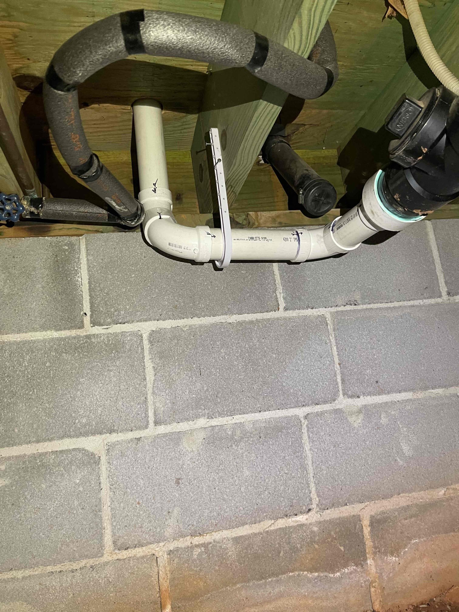 Replaced kitchen faucet and stop valves. Customer asked about getting a dishwasher replace. Notified her we don’t do dishwashers, but we could add the tie in that the Home Depot installers would require to install a new dishwasher for her, as they will not install one if the drain and water connections are in the crawlspace. We also noticed the drain outlet under the sink was very high, and the homeowner stated the drain frequently builds up grease, as all of the tubular piping was working as one giant p trap. We received approval to cut out the piping under the sink, and reroute it down through the floor and connect it back into the existing plumbing. Once I cut out the old tie in in the basement, I noticed the entire 3” pipe is packed full of grease. Attempted to snake it, but the grease was rock hard and I was unable to get through it with my smaller snake. Kitchen drain line needs to be replaced, as well as the laundry drain that connects into it as it is severely back pitched. Lef