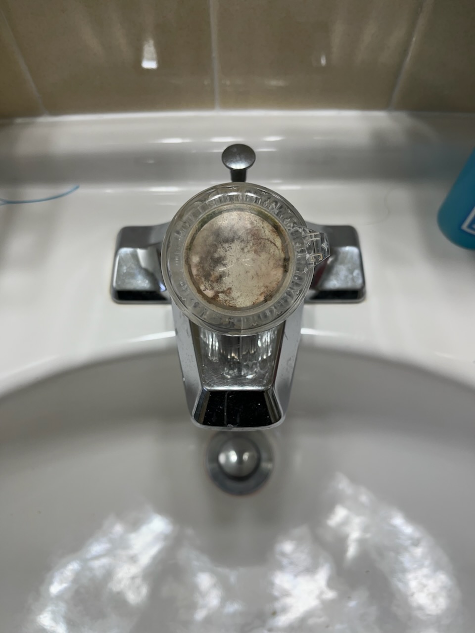 Call for bathroom faucet that is difficult to use.

Arrived and met with Ms. Kay and family. Ms. Kay has had recent health difficulties and would like the faucet to be easier to use.

Inspection revealed that the old faucet is a pull and twist style single handle. Shut off valves are old half inch style. Pressure on home is 60 psi at ~5pm on a weekday. 

I replaced faucet with a Moen faucet. Faucet has bar handles, easy to grab and activate. Replaced pop up drain with a push button style drain to ease use for Ms. Kay. Replaced bad shut off valves with new quarter turn valves. Removed metallic p trap assembly, which are prone to failure, to reduce risk of water escaping and making floor slippery. 

I also noticed toilet was not secure. I slightly tightened bolt and also applied caulking. These items are done as a courtesy.

Turned on water and tested all work. Water heater turned back on. I discussed the benefits of our maintenance membership program, highlighting specifically the thoro