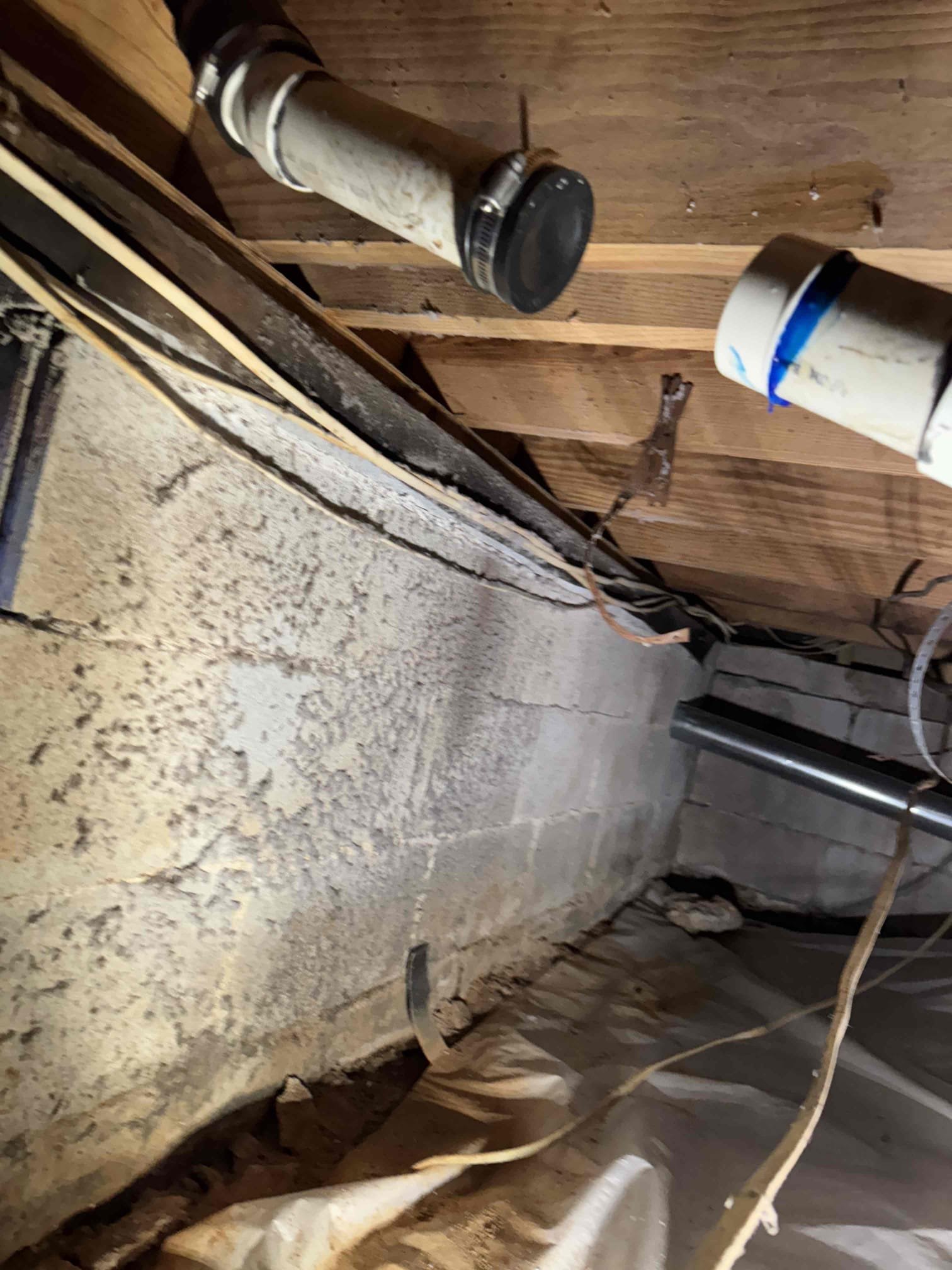 Drill new hole through cabinet and bring up new 2 inch PVC piping. Install new basket strainer and rework piping under kitchen sink and connect to new 2 inch PVC piping and install Studer vent. Also in crawlspace rework 3 inch PVC piping and connect 2 inch. Also cap off old drain line in cabinet on roof and in crawlspace.

Customer stated that there was water pouring somewhere in kitchen. Found that drain line in wall has failed. Gave customer quote to replace existing drain line. Customer agreed to quote and we install new drain line and reworked. Also capped off old drain line and also capped off vent on roof and in crawlspace. Tested and no leaks were present at this time. Cleaned up work area.

Also, kitchen sink was damaged in process. Didn’t install new sink because the restoration mentioned that cabinets will have to come out.