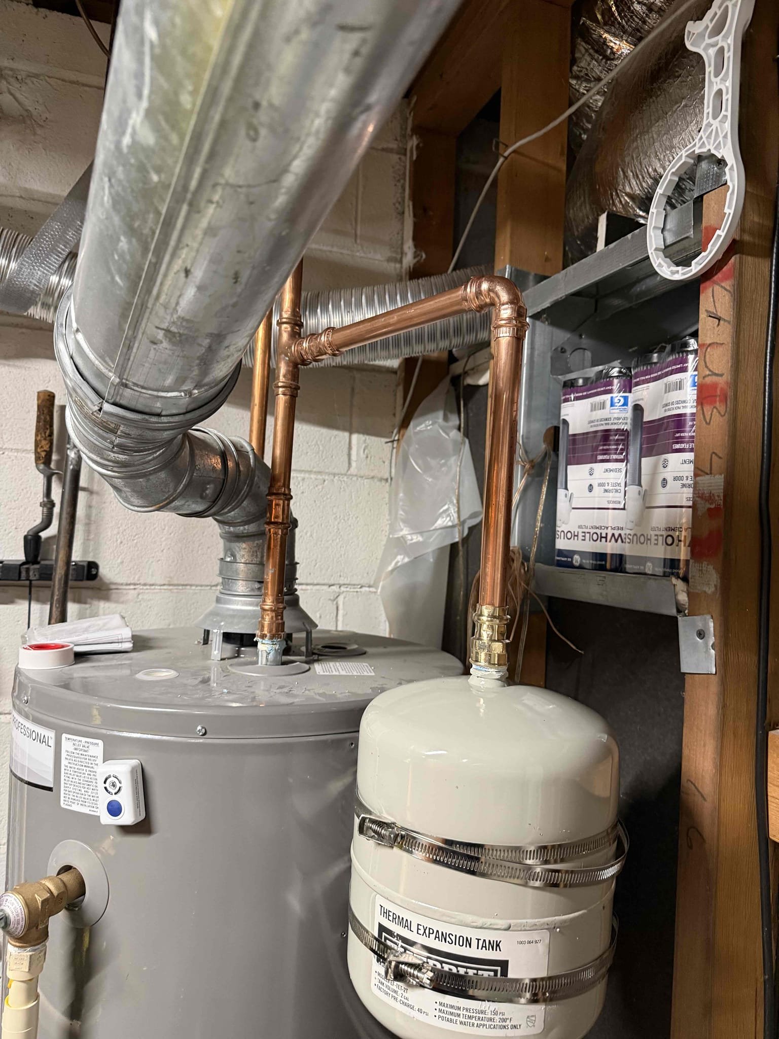 T&P valve leaking upon arrival. Customer stated he believed he had the water heater set on too high of a temperature and now the T&P valve is leaking. Also noticed expansion tank full of water and not supported properly. Informed customer we could replace both the T&P and the expansion tank as well as mount the expansion tank. Gave customer estimate, customer approved estimate. Installed new T&P valve and new expansion tank supported by a mounting bracket. Turned water on to check for leaks. Found no leaks. Fired up water heater, water heater is working properly. No leaks upon departure 