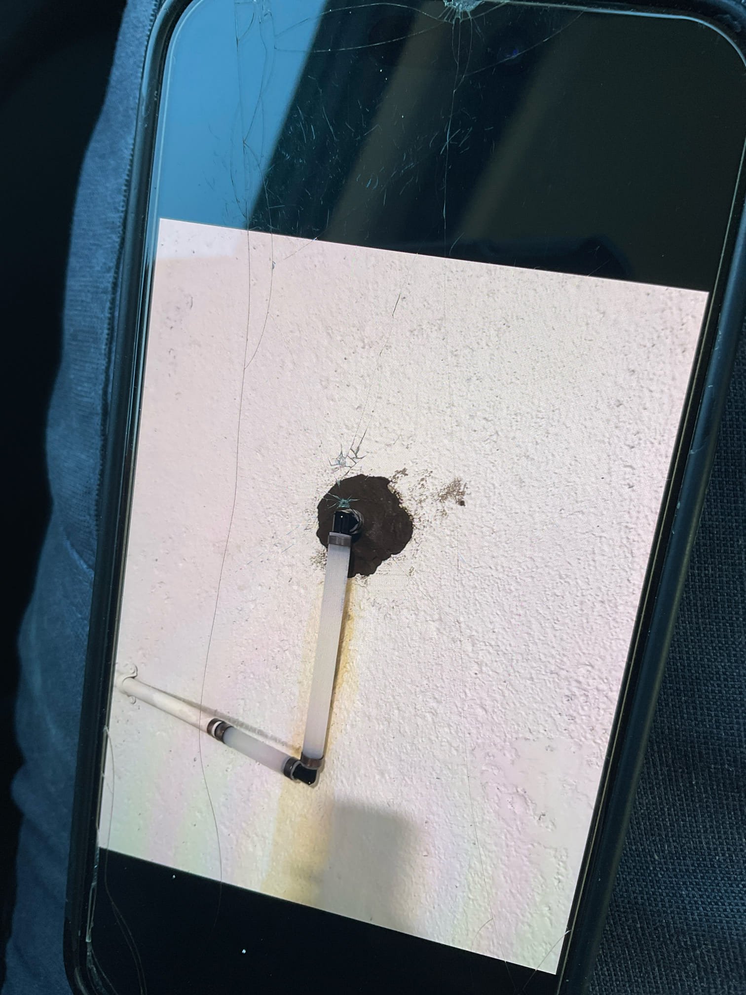 Cut out existing waterline out foundation wall, and install new waterline through foundation wall. Seal penetration properly.

Customer stated that where penetration was for water line water and mud was leaking in. Gave customer quote to fix and customer agreed. Shut water off at the meter and dug down to waterline going through foundation. Cut out pipe going through foundation one replaced with new one. Turned water back on and tested for leaks. No leaks were present at this time so I went ahead and sealed up penetration hole and covered back soil. Also was send estimates for other plumbing repairs customer wanted done. Cleaned up work area.