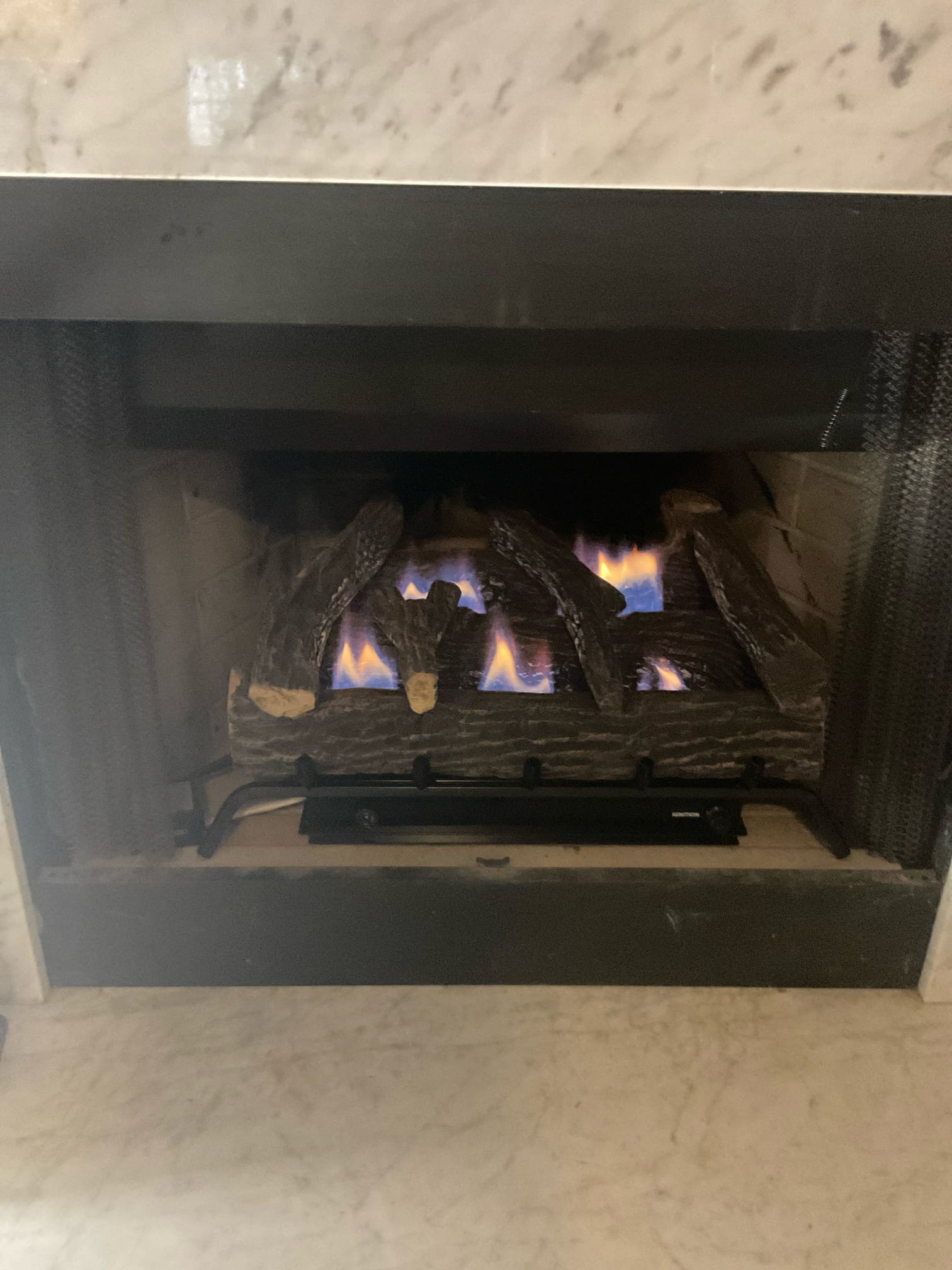 Installed customer supplied fire log set , gas line modified and connected 