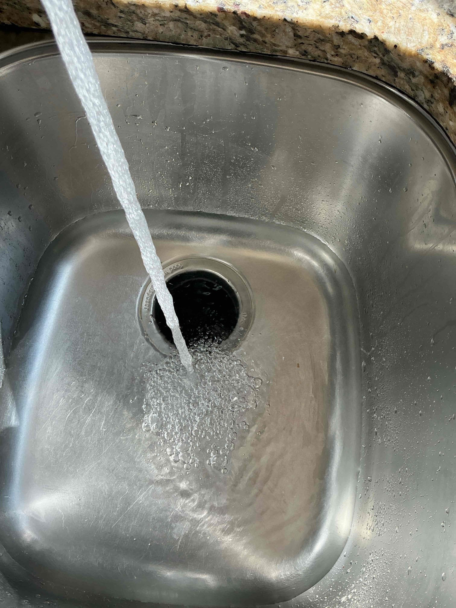 Customer called us out for a leak under the sink during our visit we performed a thorough evaluation of the sink area and identify the root cause of the leak as a failing garbage disposal unit given that the existing disposal was leaking . The only viable solution was a full replacement. The customer agreed to proceed with this replacement we supply and installed a new half horsepower badger model five disposal unit after installation we thoroughly tested the unit to ensure it was functioning perfectly and we confirm that everything was working as intended. Additionally, while on site we measured the home water pressure and found it to be high at 120 psi we provided the customer with a separate quote for installing two pressure reducing valves PRV’s to help regulate and maintain optimal water pressure in the home