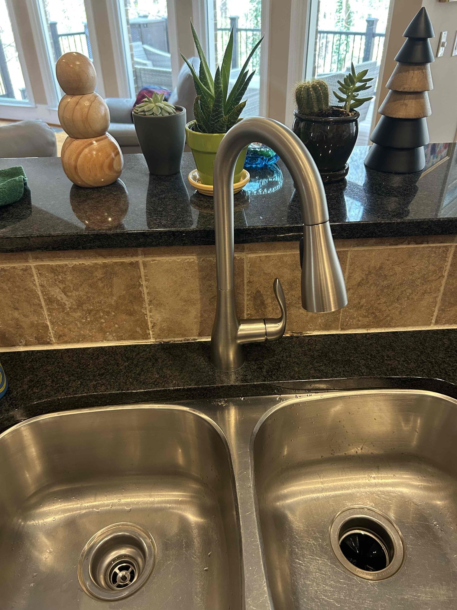For this CUSTOMER, we went ahead and replaced the kitchen sink faucet due to a leak on the internal supply line. There is no fix for it in that case we had to go ahead and replace the faucet so that is exactly what we ended up doing with that mind, the customer supplied us with a brand new Moen faucet and one head and installed that Moen faucet came with pre-existing supply lines. Tied everything together and there’s no further leaks at this time. Customer also wanted me to take a look at the washing machine drain line. They had painters come in and remove a zip tie from the supply line and the drain line so I added a new one and no extra cost