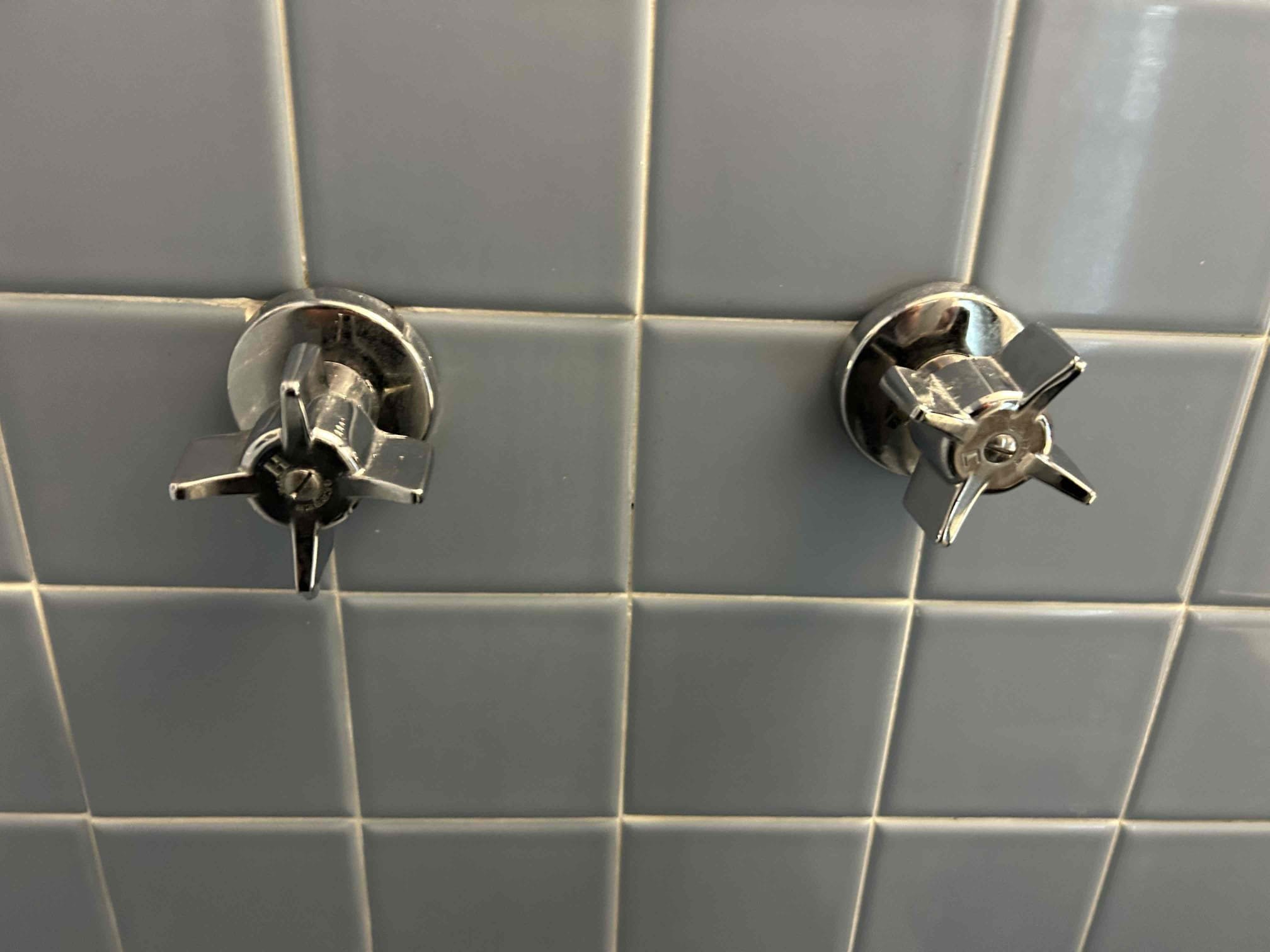 For this job it was to replace the hot and cold shower stems, I was able to successfully remove and replace the hot side with a brand new gerber stem, there is no further leak from that. However the cold side stem will need to be chipped away from the back side to remove the stem and reason is due to fact that mortar is blocking the the nut to get it out.  Y recommendation is to remove the drywall on the backside and chip the mortar from the back side and then replace the stem. At this time the homeowner wants to think it over and wait to do that. I am charging half due to the fact that I only did have of the Job. Water pressure is at 75 psi. 