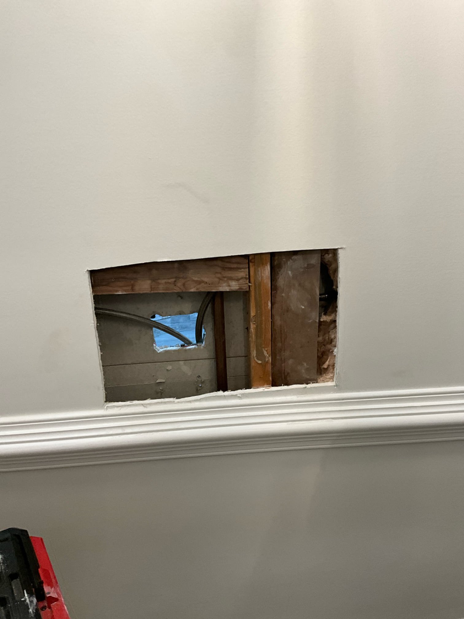 Call for loose toilet after recent work, and a shower system replacement.

Arrived and inspected all requested items. This included the powder room toilet being loose. This was resolved by reapplying the adhesive sealant. It appears as if toilet was moved slightly prior to complete adhesive cure. Toilet is not moving by the time I left the job site. 

Shower system was a panel style system of unknown brand. A new system was present on site. The complaint for the old system was that it had very low pressure, it took a very long time to get hot water, and the electrical components were not functioning. I removed old unit and found supply lines protruding 5rough a small hole in the tile. Tile was broken in several places behind the unit, likely during this systems installation. I had to turn water off to the home during this work because shut off valves were inaccessible inside the wall.
Due to the nature of these panel systems, I went through all connections inside the panel with water o