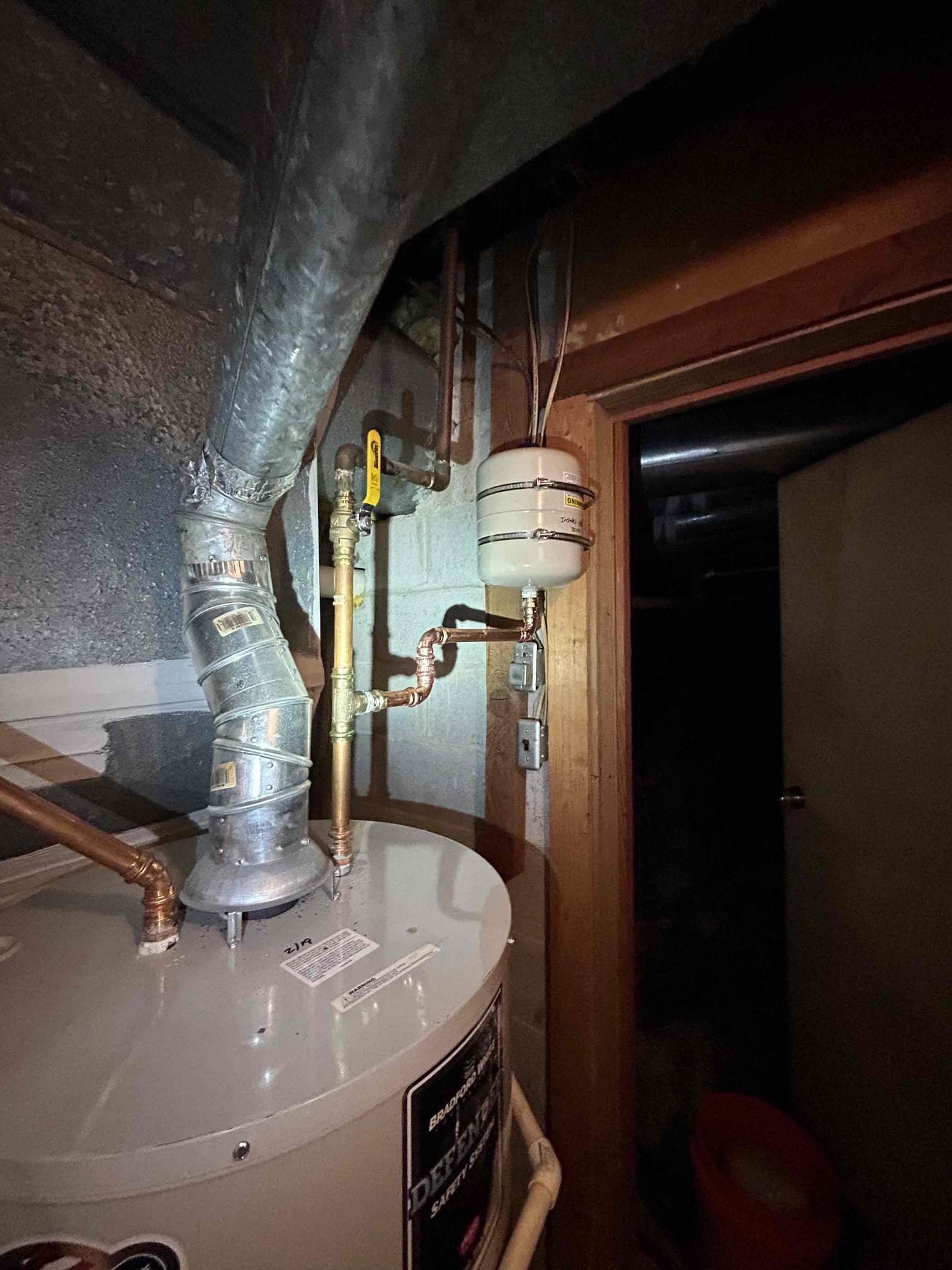 For this job went ahead and replaced the pressure reducing valve in the basement behind the HVAC unit. The water pressure was kind of low at 40 psi and when the toilet was flushed, it dropped down to about 30 psi so therefore what I’d recommended to do is replace the pressure reducing valve with brand new one furthermore, the customer didn’t have a shut off valve before the pressure reducing valve so I recommended we also add that as well and the thermal expansion tanks bladder had failed and it wasn’t supported correctly so therefore we had to go back and support it with a bracket with a piece of wood. I was going to mount it on the tank however there’s a little to no access, to the main shut off valve if we did it that way, so therefore I didn’t do it. I strapped it to the wood screwed it in tighten the bracket there’s no leaks how to use a couple different 90s to get it over there and almost essentially create a bridge once that was complete. There’s no leak on the plumbing system r