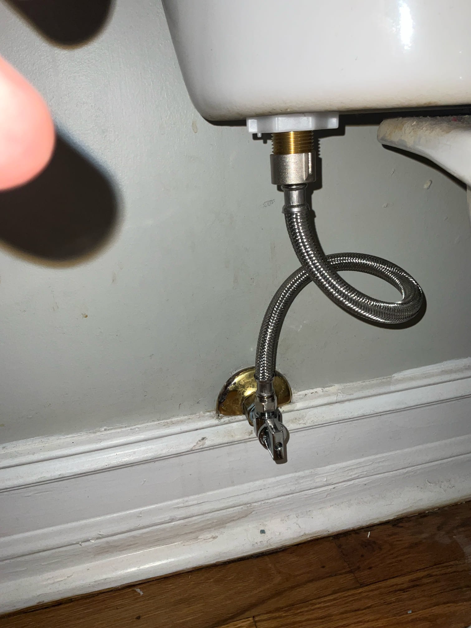 Customer had a toilet with a loose trip lever, slow filling toilet, and a failed stop valve. Diagnosed that the washer in the stop had disintegrated and stopped up the fill valve and supply line causing a slow filling toilet. Replaced the stop, supply line, fill valve, flapper, and trip lever to correct the issue. Tested all work to ensure proper function and no leaks, none were found.