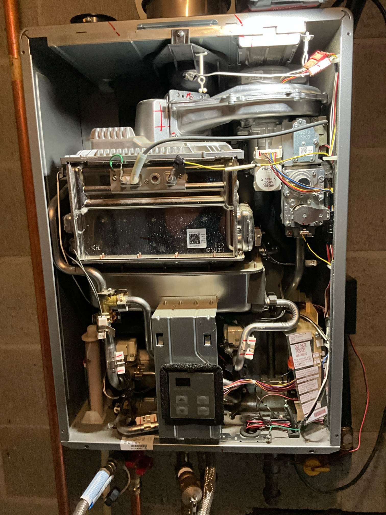 Return to install ordered Rinnai exhaust assembly.

Removed old assembly, installed new part. Replaced gaskets in gas conversion chamber. While on site I also flushed the water heater. The flush resulted in SIGNIFICANT amounts of sediment removal. 

Tested hot water at tap, cleared line of residual air.



