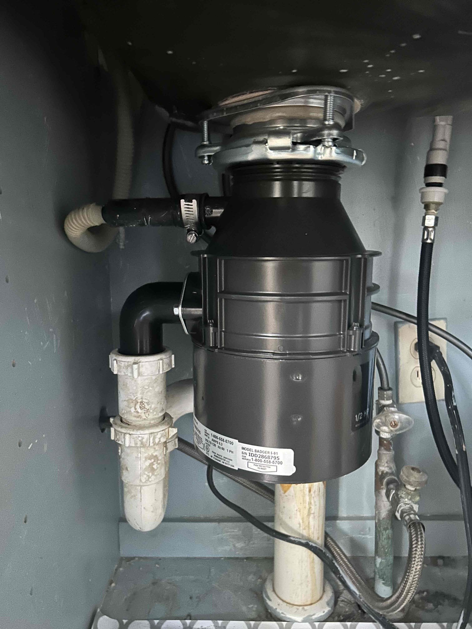 For this customer, we installed a brand new half horsepower garbage disposal in the kitchen. The other one was from 2015. However, we did try to gym for replacing the unit and unit to be unjammed and as a result needed to replace the unit so that is exactly what we did swapped it for another half horsepower garbage disposal And the customer is all set with a brand new one installed the new waste flange with brand new putty had to be very gentle on the type of sink this was it was partial cast-iron and partial plastic acrylic. It was an older blue sink so I’d be very careful on Putting the new disposal in once complete. There are no leaks. The water pressure on the house is 45 psi the water heater is in the attic unfortunately I didn’t get to take a look at that. CUSTOMER is all set with a new disposal. 