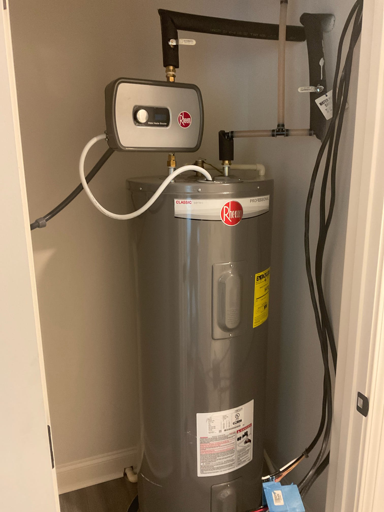 Replaced a tank water heater with electric tankless customer supplied 