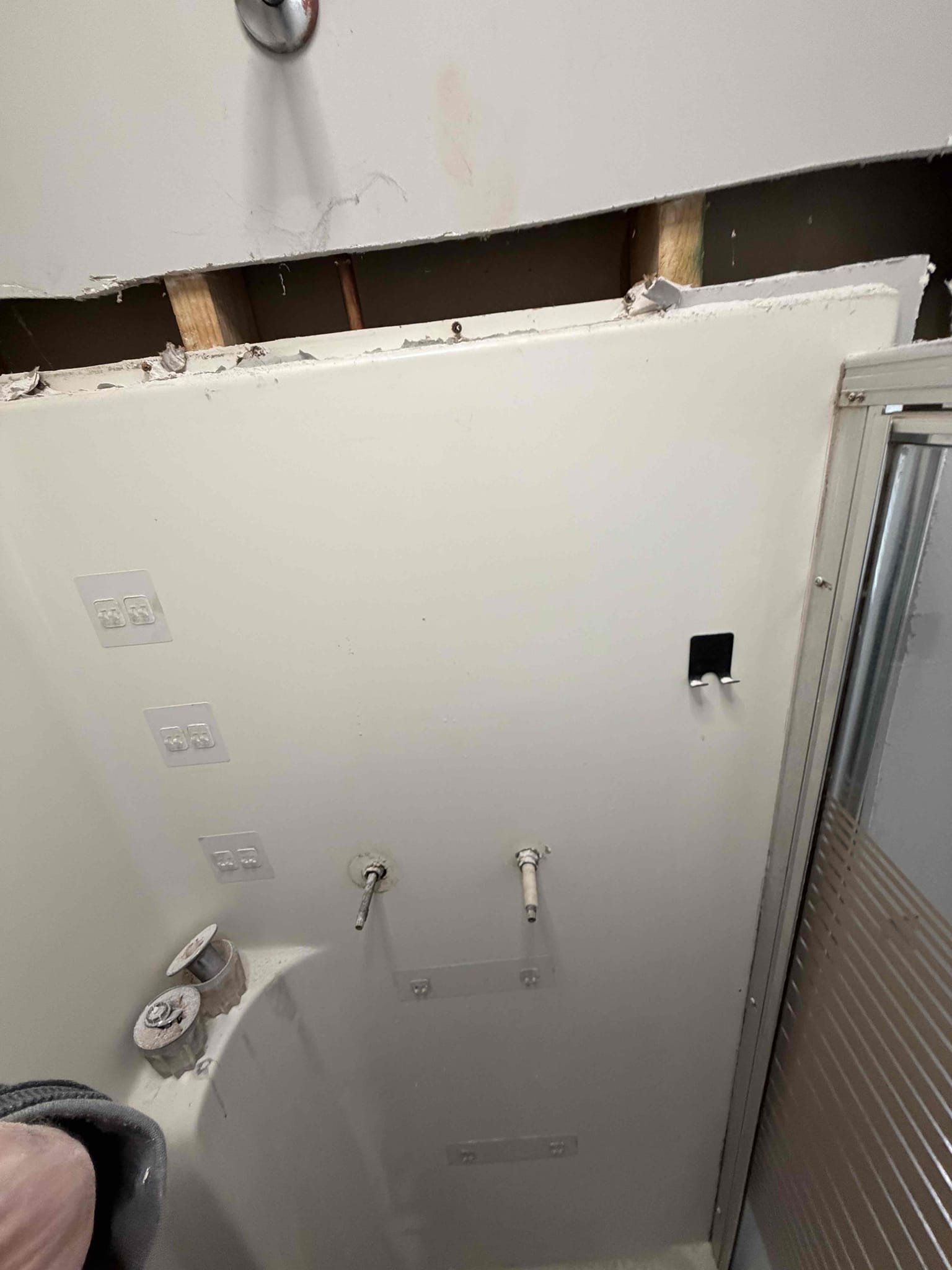 Remove shower. Bust up slap and make repair on leaking water line. Any additional work needed there will be an additional charge.

Also NO WARRANTY ON REPAIR due to type of pipe. 

Customer will be responsible for any reconstruction needed. 

Chen plumbing will not be responsible for reinstalling shower and or for damages to shower.

Customer Todd and Kim Davis stated that they had a leak coming from the slab in the bathroom. From access point saw water bubbling up on cold side waterline. Gave customer quote to remove shower and bust up concrete to find leak and make repair. Customer agreed so we went ahead and removed shower. Use jackhammer to bust up slab and locate leak. Found leak on cold side waterline on a gray poly pipe. Shut water off at meter. Cut out bad section of poly pipe and replaced with pex pipe. Turn water back on and tested, and no leaks were present at this time. Wasn’t able to reconnect tub valve because it had the wrong adapters on it. Stated to customer that it wi