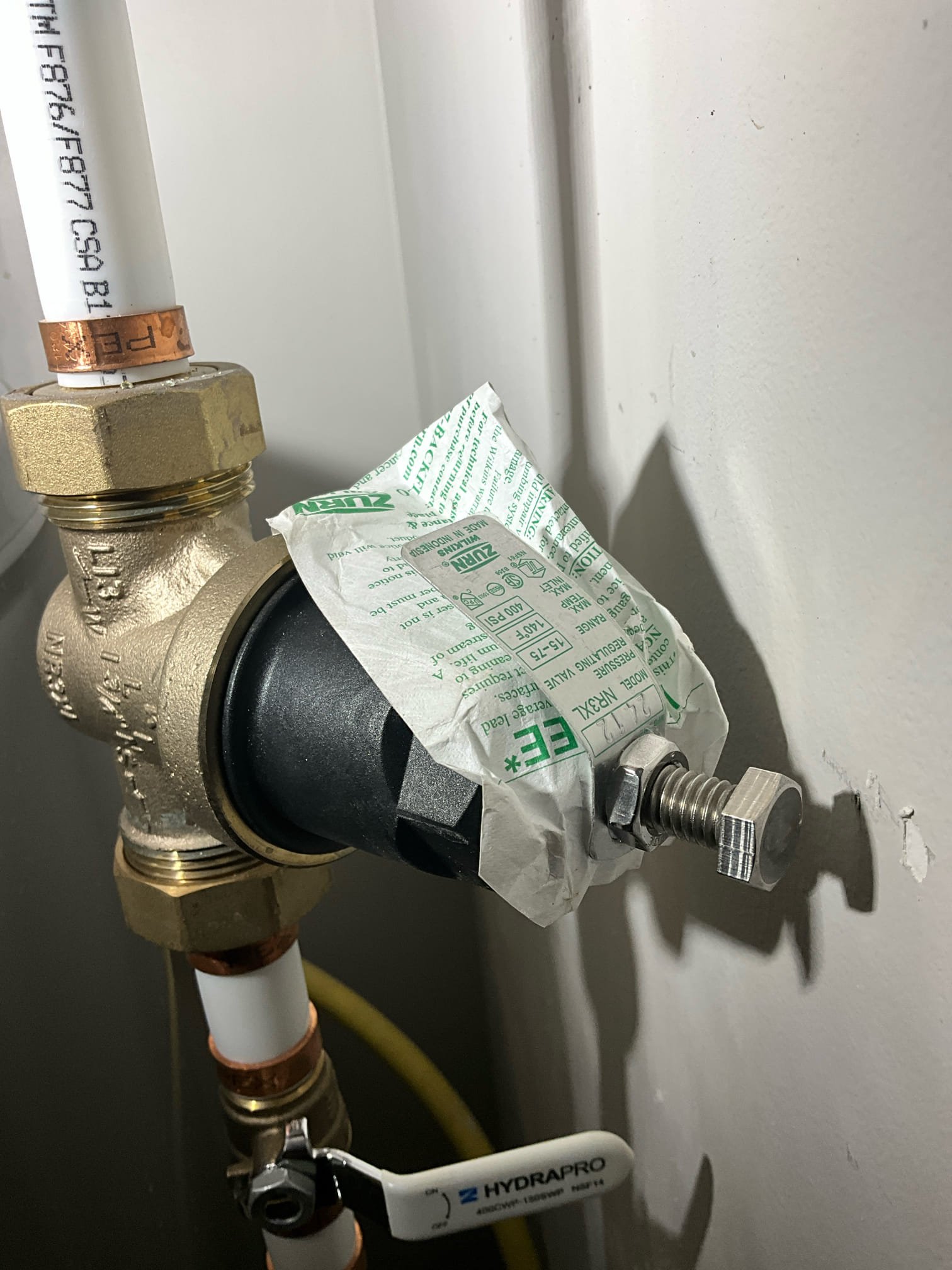 Call for water leak in ceiling of first floor bathroom. 

Arrived and met with Ms. Janes. She showed me the water dripping from the ceiling. I inspected the upstairs bathroom and found water inside the vanity, and a drip hanging on to the elbow of half inch cpvc. When testing, I found a hairline crack along the elbow. Pressure regulating valve only about a year old. Water heater also just over a year. Pressure not tested as water was off, but I believe prv is functioning fine due to young age.

Cut away broken section of cpvc. Installed new ball valve and pressurized system. No leaks or drips found. 

I also discussed the benefits of our maintenance membership program. I have also provided two estimates, one for a whole house water filtration system, and another for a Moen Flo automatic leak detection device.

I have left contact information for reliable restoration, and recommend they be contacted to assess water damage to home.