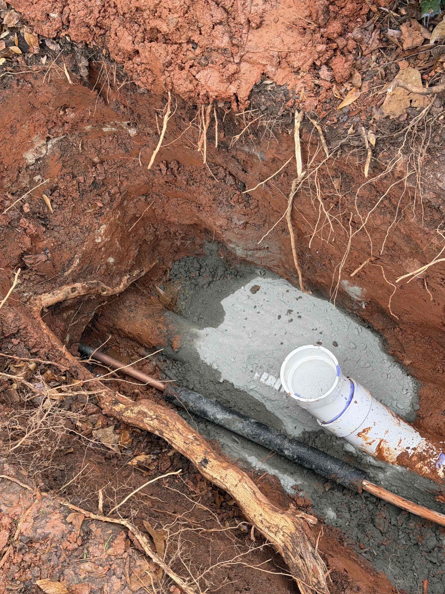 Sewer Main Outdoor Installation - 40 feet to 90 feet in developed length AND less than 12 feet at deepest point: Installation of an exterior sewer line ranging from 40 to 90 feet in developed length, with trench depths of up to 12 feet. Scope of work includes excavation, proper pipe placement with required slope for drainage, installation of bedding material, secure tie-in to the existing sewer or municipal system, and thorough backfilling for stability. Cleanouts are included as needed for access and maintenance. All materials and methods are selected to support long-term performance and system reliability.

Warranty: Includes a 5-year parts and labor warranty covering the complete sewer main installation.

Warranty Disclaimer: Warranty excludes damage or blockages caused by improper use, including flushing “flushable” wipes, feminine products, paper towels, grease, or other foreign objects, as well as excessive use of chemical drain cleaners. Proper use and maintenance are required t