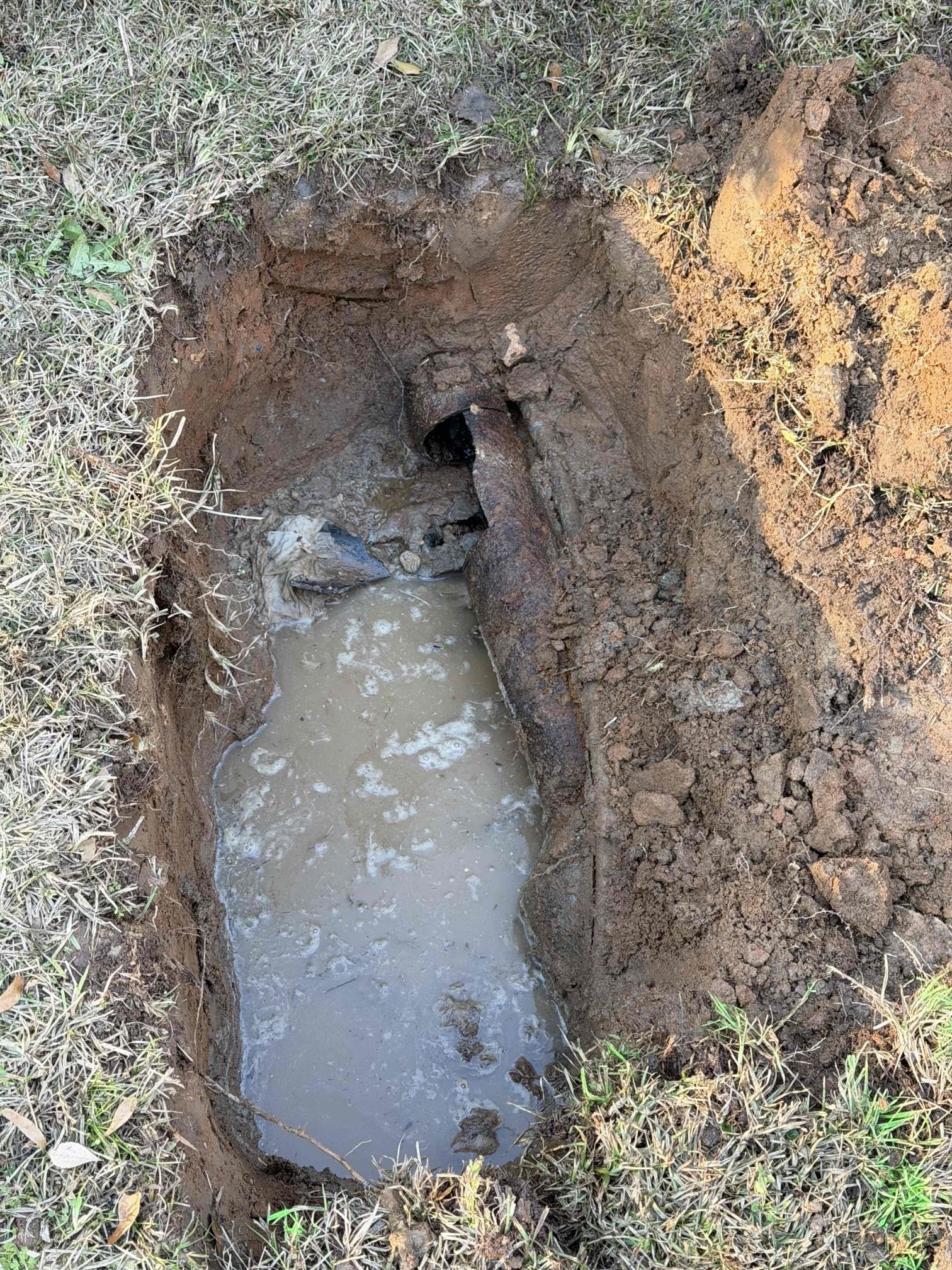 Customer stated that everything in house was backing up. Stated to customer first steps will be to pull toilet and run camera to inspect sewer line and customer agreed. Went ahead and pulled toilet in master bath, and ran camera and found that there was a blockage outside of home. Dug up at marked location and broke pipe. Now customer will be able to use bathroom throughout the night and will return tomorrow to install new sewer line from home to street. 

Returned and installed new sewer line from house to city. Install a two-way cleanout by home and install a 6 inch cleanout for city. Cover back soil and cleaned up work area as best as we can. Recommended to customer to wait about three weeks and then call landscaper. 