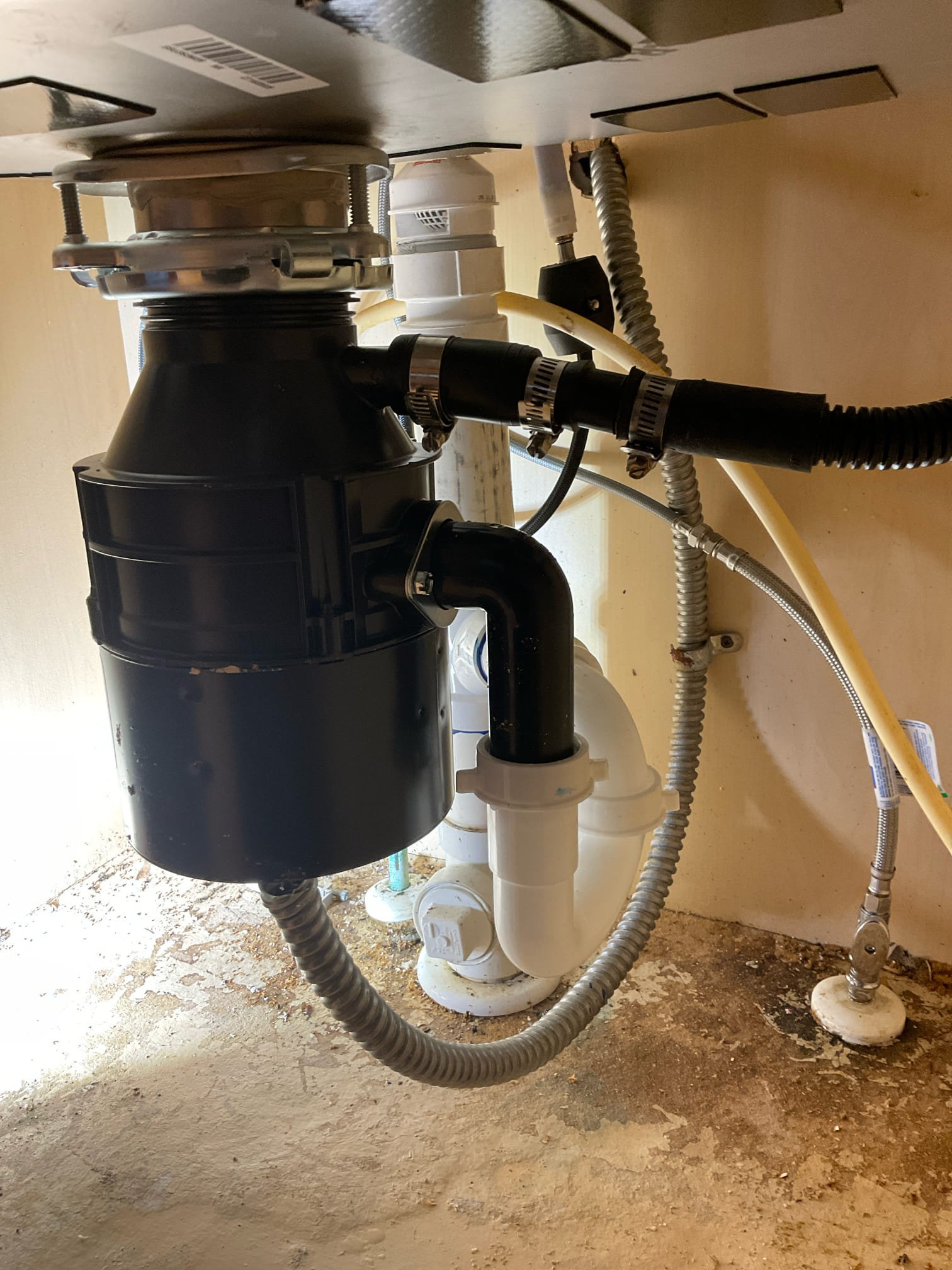 Replaced three water stop valves , new supply line , installed customer supplied disposal with drain replumb to fit , new p trap and AAV installed under the kitchen sink