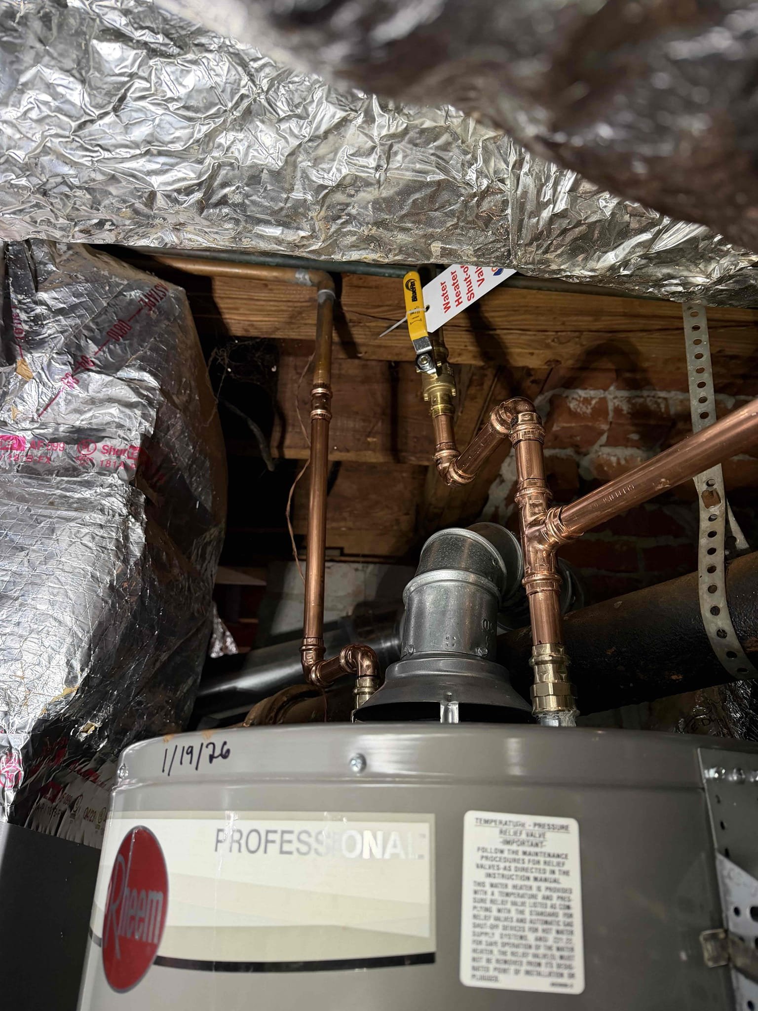 Remove existing water heater and haul away. Furnish and install new 40 gallon gas water heater with new tank shut off and thermal expansion tank with bracket. Also installed drip pan under heater.

Shut water off to home. Drain down existing heater and cut out and hauled away. Furnished and installed new 40 gallon gas water heater with new thermal expansion tank and tank shut off. Had to rework vent for proper fitment. Also wasn’t able to install drip pan under heater because of HVAC system in the way. Turned water back on and tested. No leaks were present at this time. Cleaned up work area.