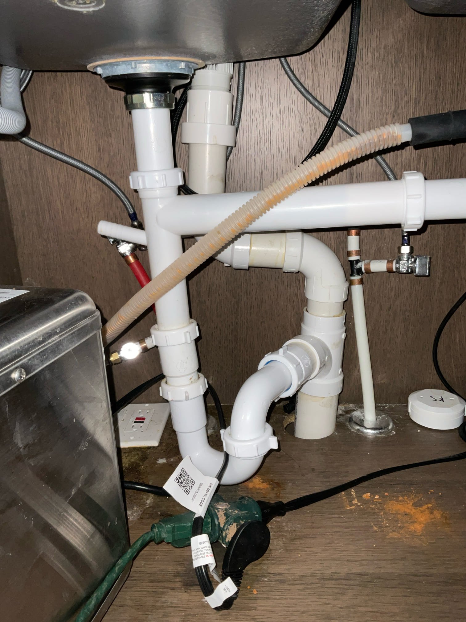 Rework drain and replace ptrap under kitchen sink.

Customer stated that there was a leak on P-trap under kitchen sink. Took a look and found that at one point there was a leak but also noticed a leak from Insta hot unit. Went ahead and reworked drain and replaced P-trap. Tested by filling multiple times and dropping in no leaks were present at this time. Cleaned up work area. Will send estimate to get Insta hot unit replaced.