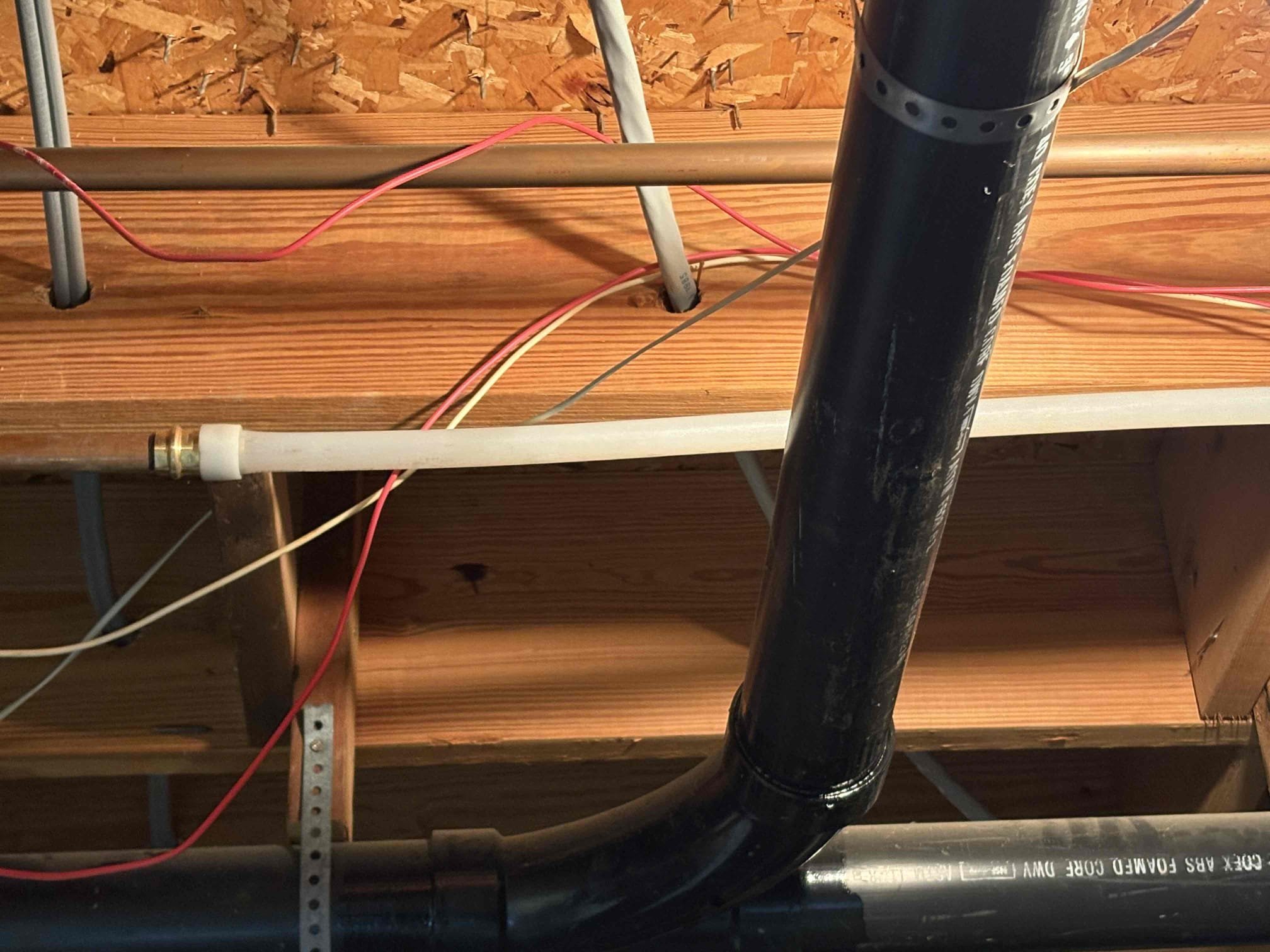 Client called us out due to their left hand master bathroom lavatory sink drain clogging up and holding water. They tried a hand snake but were unable to get any relief. I ran my small chain snake and also could not get any relief. We got the sewer camera down the line as far as we could, then located it. We found that lavatory on top floor runs all the way down and ties into the system in the basement, just behind the kitchen tie in. We discovered that entire trunk line catching all the upstairs fixtures to be completely full of grease from the kitchen line. We cleaned out a lot of grease out of the line and then used water hose to wash it out further. The line was a lot more clear of grease, but it was still backing up when I had the hose running for a minute. Using my flashlight I could see at the other end of the pipe that it is still caked with grease. Both kitchen and the other fixtures should drain normally, but sooner or later that large amount of grease left on other end of li