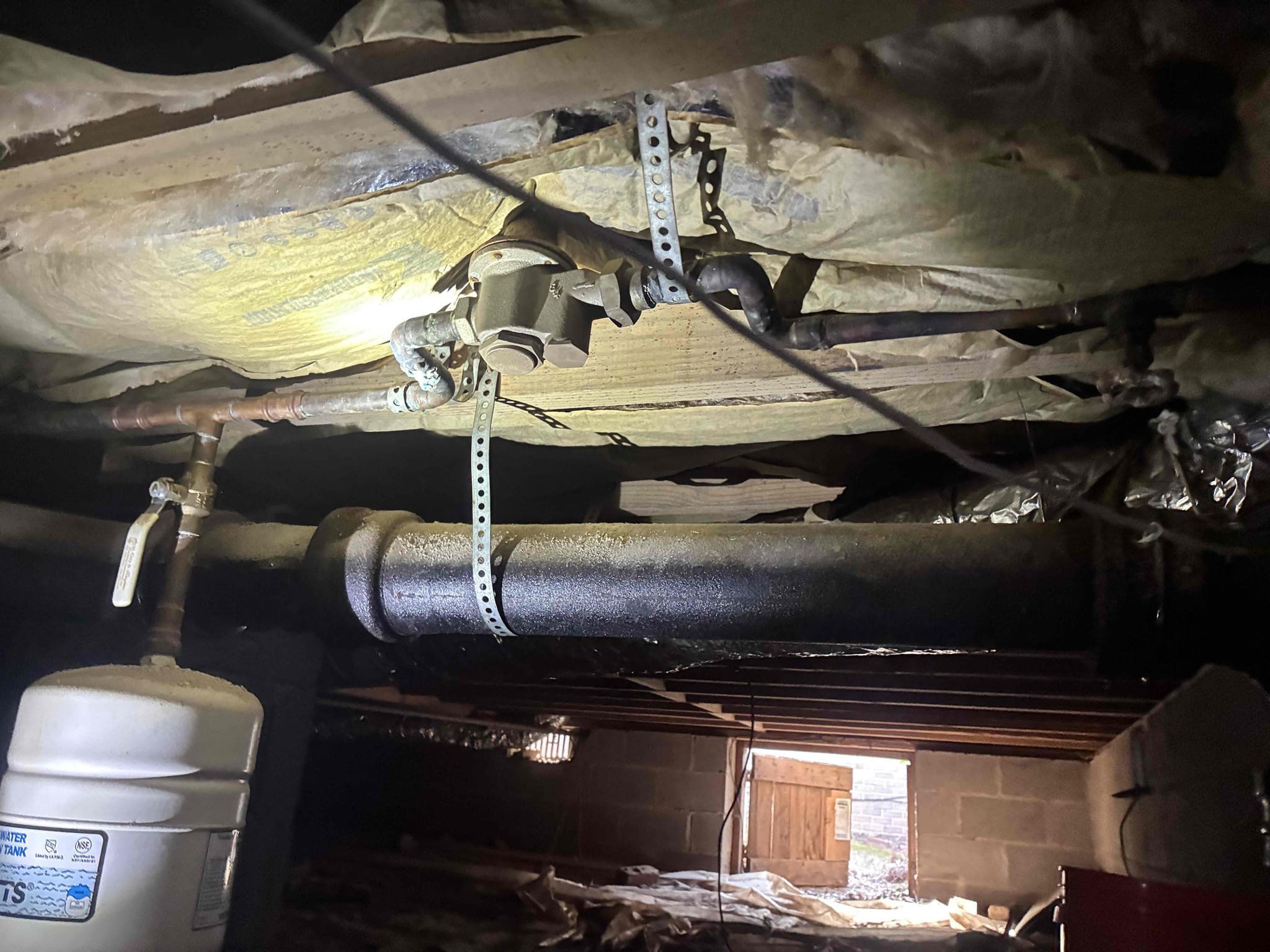 Customer had popping sound coming from 10 year-old  water heater. Explain to customer about sediment in tank and reason for popping sounds gave customer options to replace heater. Also found pressure to be at 90 psi along with a bad thermal expansion tank in crawlspace. Give additional options for repairs/replacements on these items. Replaced heater with Rheem 40 gallon gas water heater with new ball valve and Thermal expansion tank. Also relocated thermal expansion tank from crawlspace to laundry room with heater. Installed PRV in crawlspace with new ball valve set pressure to 60. Cap gas line going to light pole in front of house. after work was complete checked all areas for leaks and proper function. 