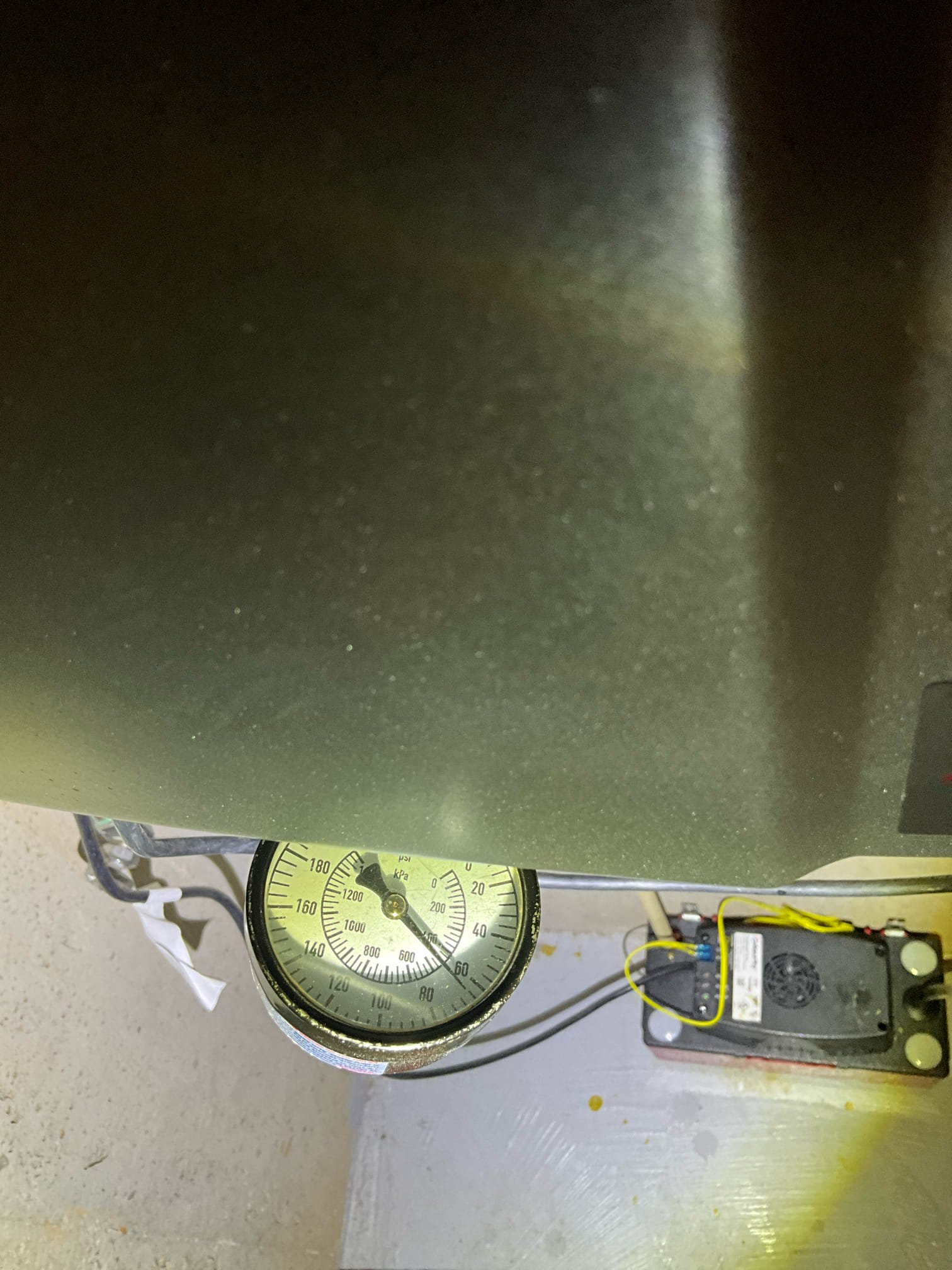 Customer has a rhythmic metallic sounding click in the wall by kitchen, usually late at night. Based on questions discussed with the customer, it doesn’t appear to correlate with direct water usage of any kind. Performed a pressure check and drop test for the prv. Pressure sits around 65 psi, but a lavatory faucet drops the pressure down to 50. Customer had questions about greening on the copper pipes in the basement. Pointed out areas in the middle of copper lines with spotting and explained they are potential leak point in the future. Left a quote for a Flo by Moen and a new PRV based on these first two observations. The tankless unit has a recirculation tee upstairs. When water is heating over night to recirculate it is likely causing thermal expansion in the home. This can lead to the clicking noise that was observed and recorded by the customer. Left a quote to install a thermal expansion tank also. 