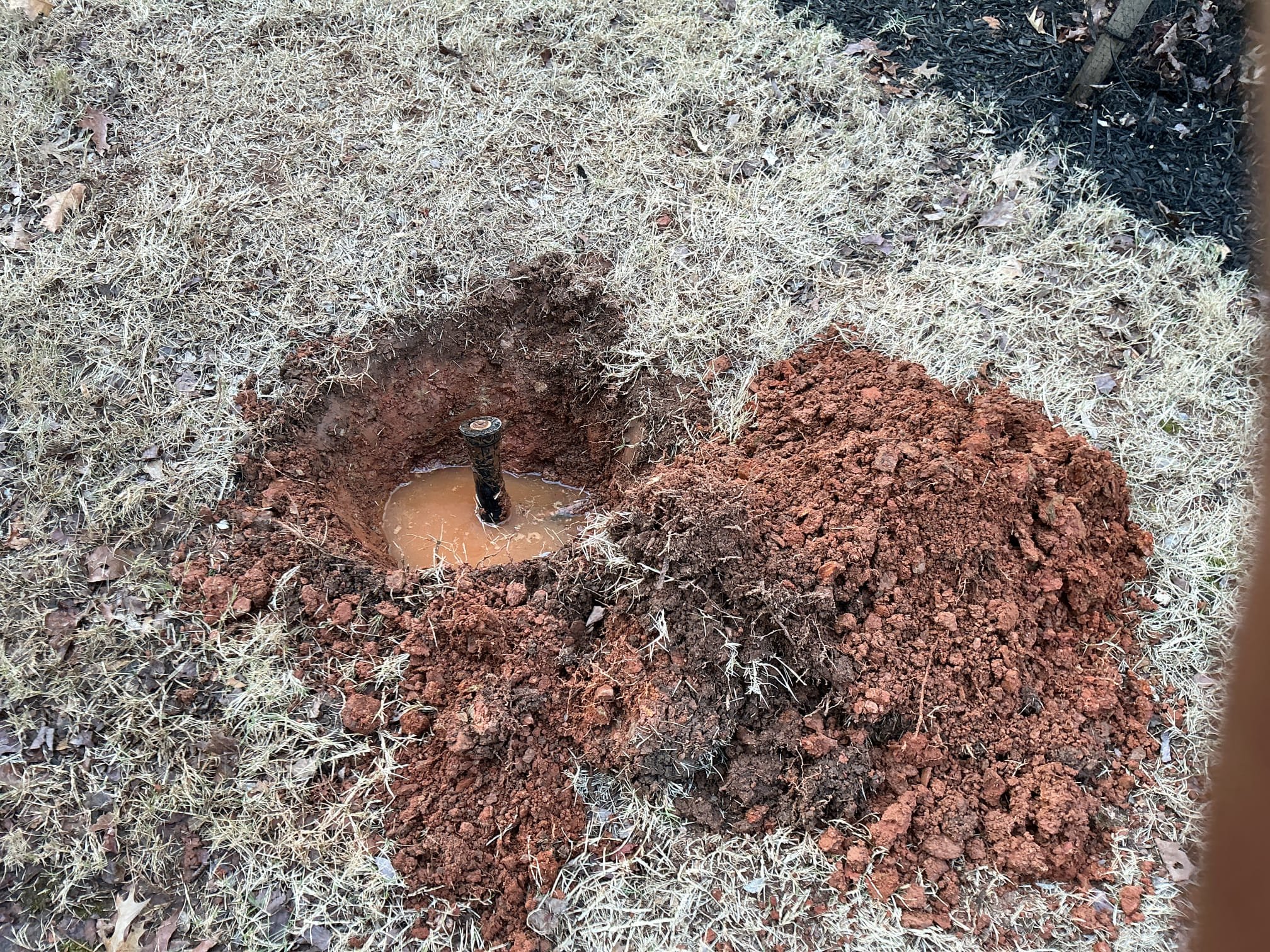 Customer had leak coming from tee for irrigation head. Customer wanted line capped. Unable to find irrigation valve. Found gate valve behind main meter box. Capped line and waited for glue to dry. Checked for leaks and backfilled hole. After turning on water found meter still slowly spinning. Found irrigation head leaking. Customer has irrigation company coming to address issues Explain to customer about active leak.