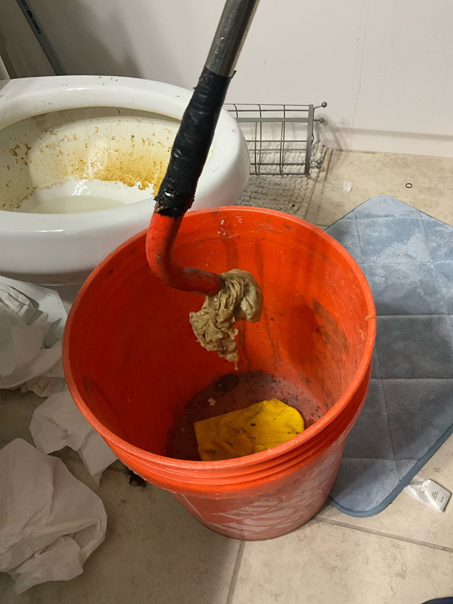 Customer had a toilet backing up on the main floor bathroom. Stoppage appeared to topically be a waste and paper stoppage. Ran the auger after customer approved work. Pulled rags out of the toilet trap to clear the stoppage. Tested toilet to ensure proper flush. 
